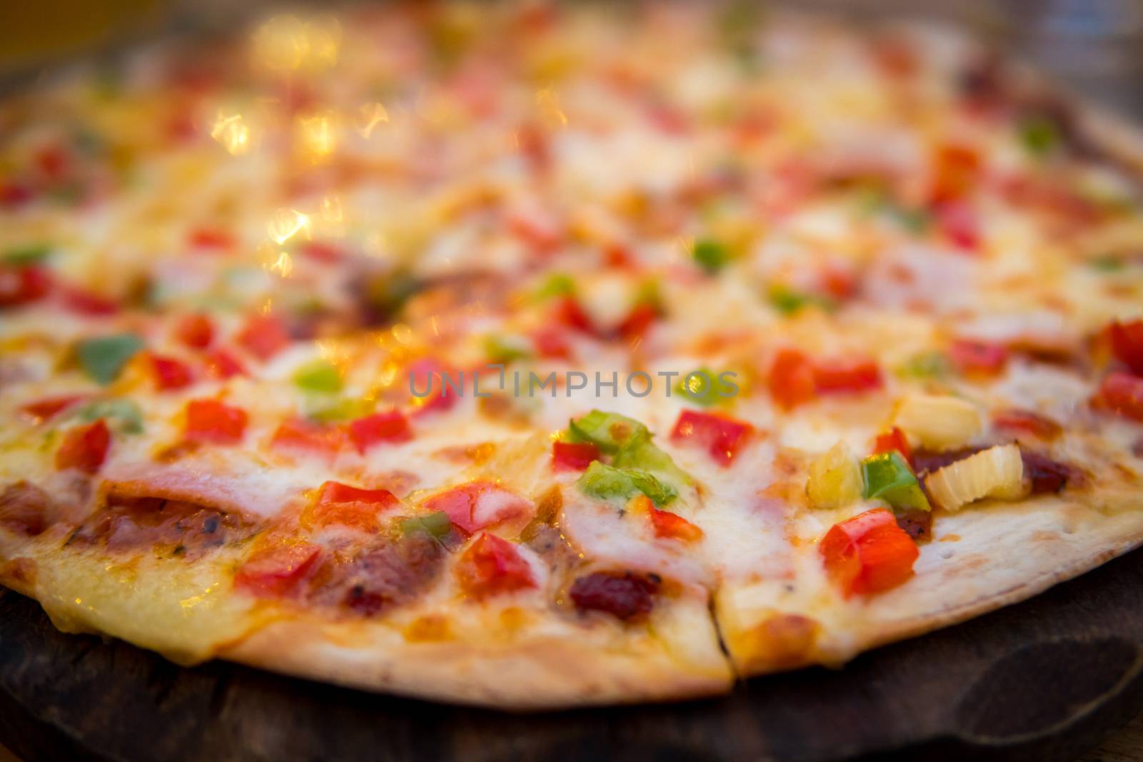 fresh sliced pizza with vegetables by antpkr