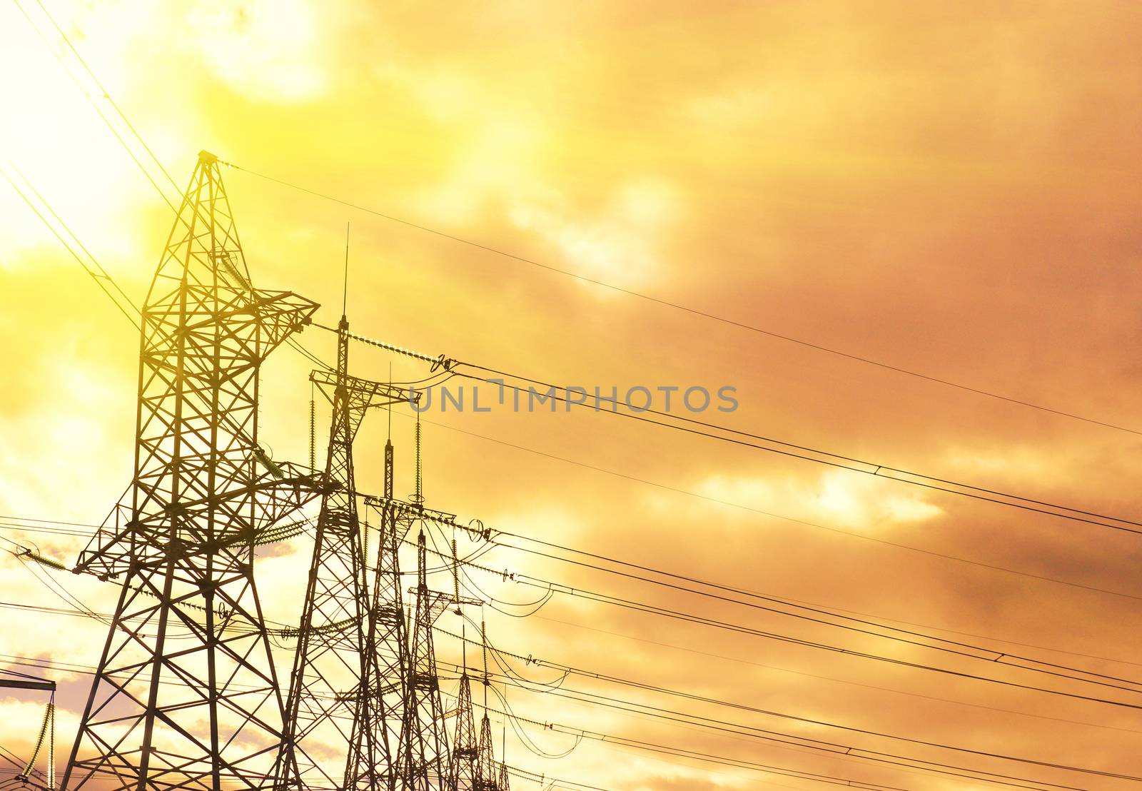 silhouette of high voltage electrical pole structure photo