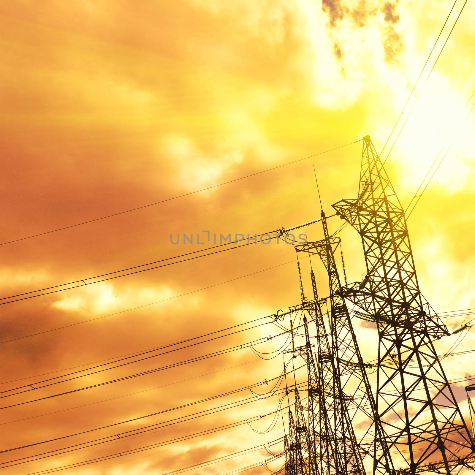 Silhouette Sunset Scene Of High Voltage Electrical Pole Structur