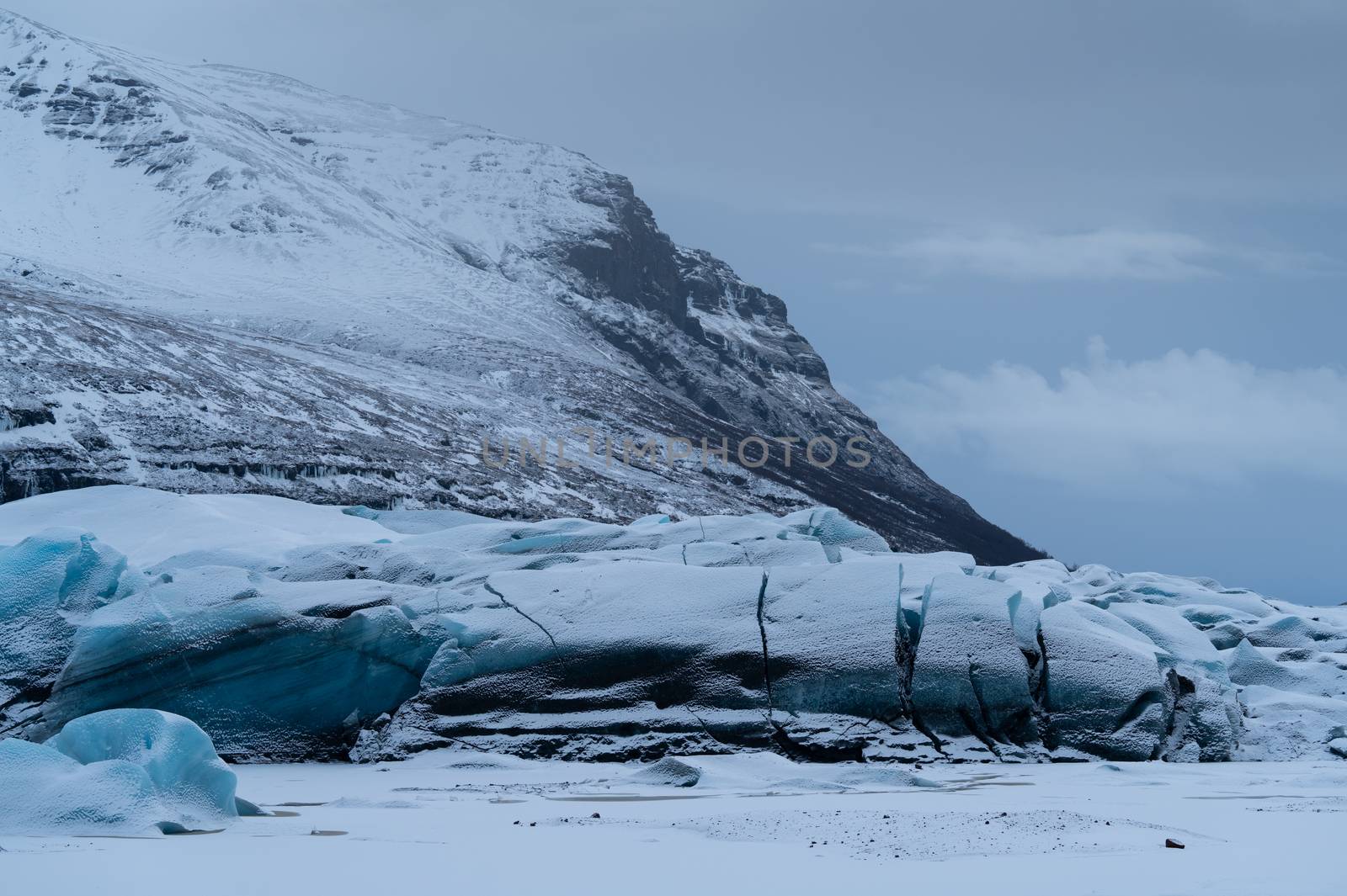 Panoramic image of the snow-coverd glacier Svinafellsjoekull on a winter day after snowfall, Iceland, Europe