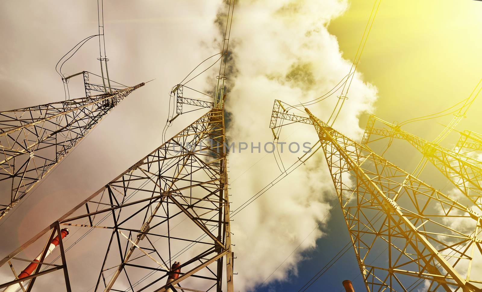 High voltage power line on blue sky background in Sunny day