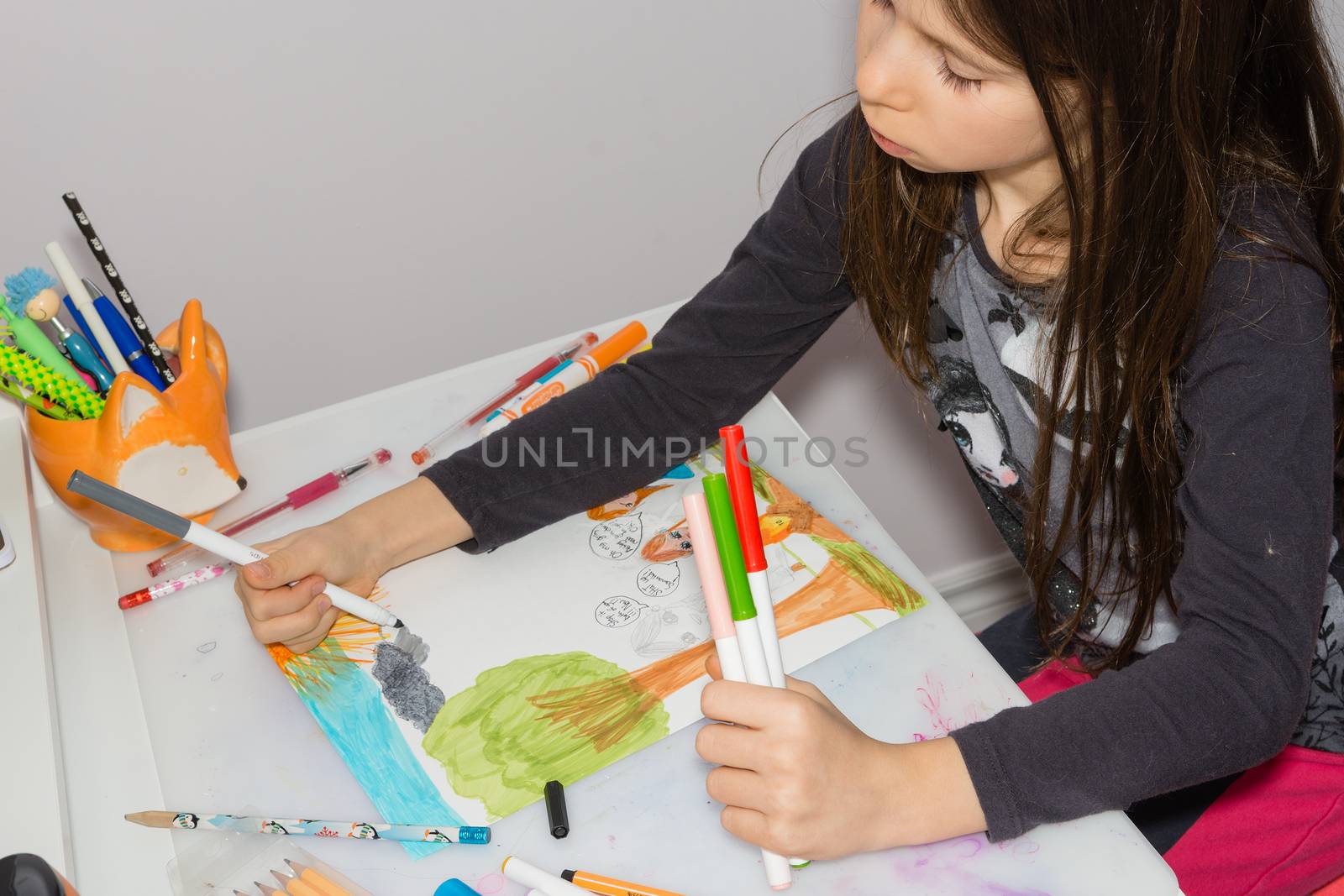 Girl painting a picture with colored markers by ben44