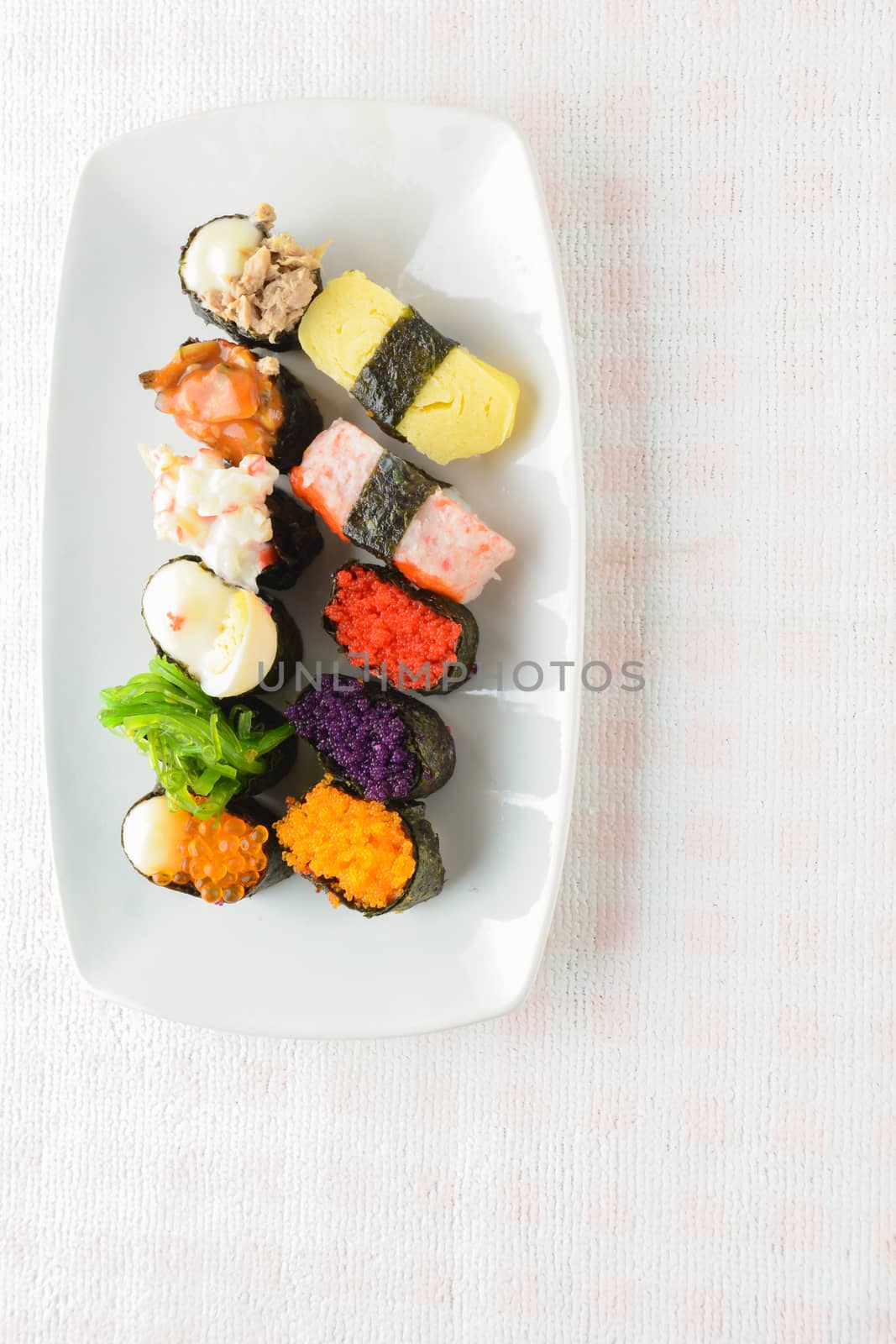 Sushi on white plate by yuiyuize