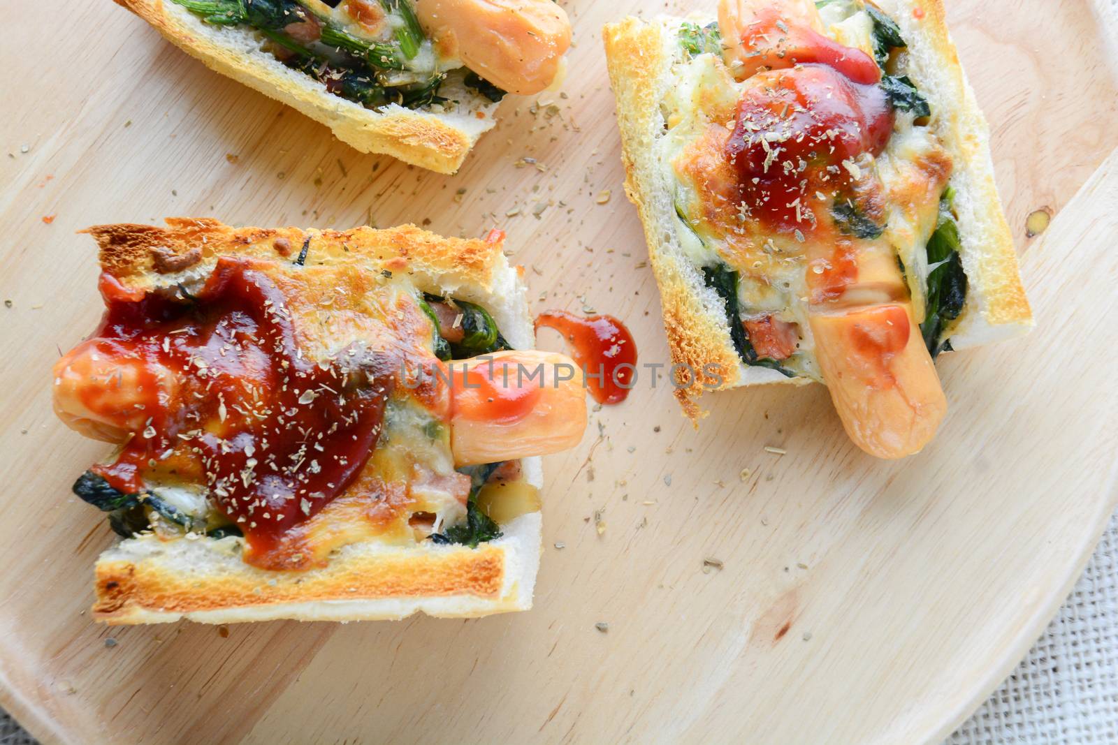 Baked Spinach with Cheese, sausage on Baguette, French bread
