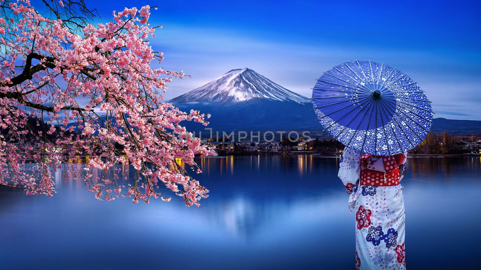 Asian woman wearing japanese traditional kimono at Fuji mountain and cherry blossom, Kawaguchiko lake in Japan. by gutarphotoghaphy