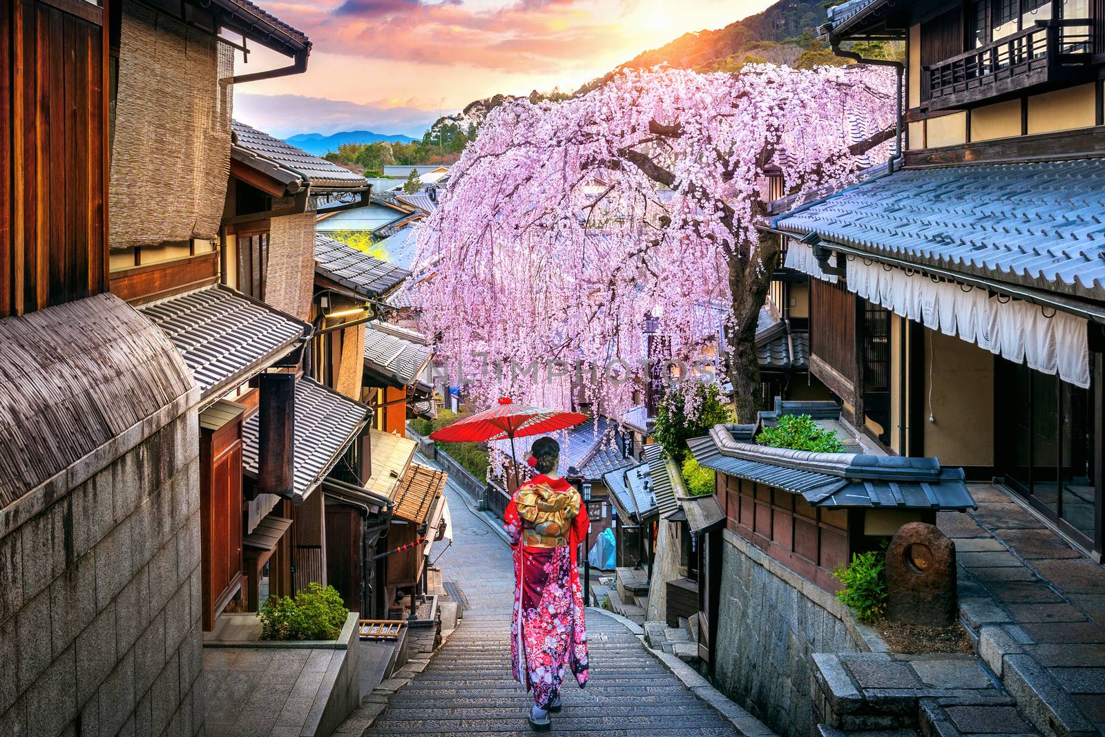 Woman wearing japanese traditional kimono walking at Historic Higashiyama district in spring, Kyoto in Japan. by gutarphotoghaphy