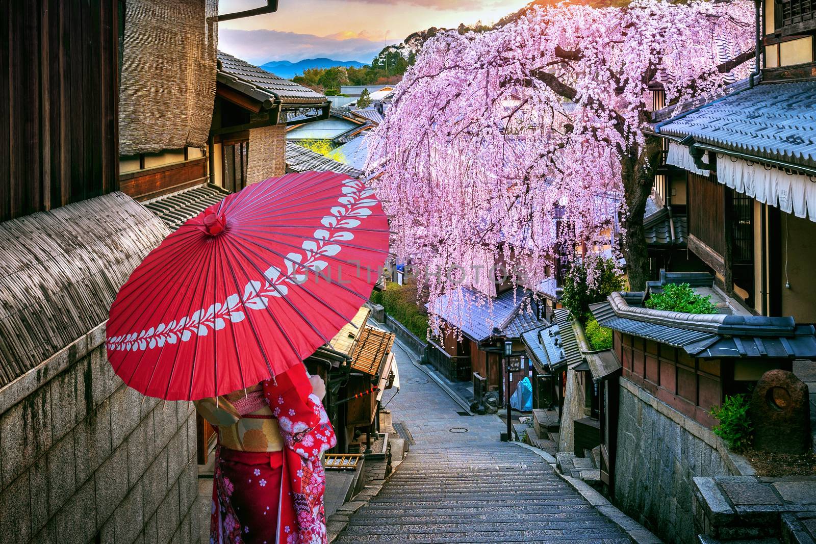 Woman wearing japanese traditional kimono walking at Historic Higashiyama district in spring, Kyoto in Japan. by gutarphotoghaphy