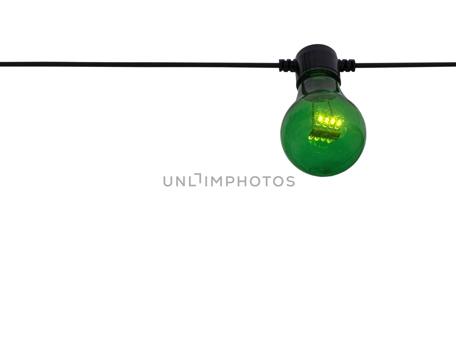 Green color lightbulb on string isolated on white