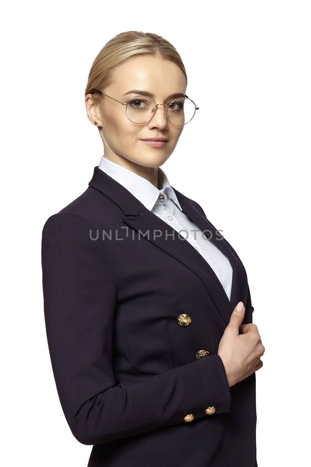 Portrait of young beautiful blonde woman in a gold eyeglasses and dark business suit.