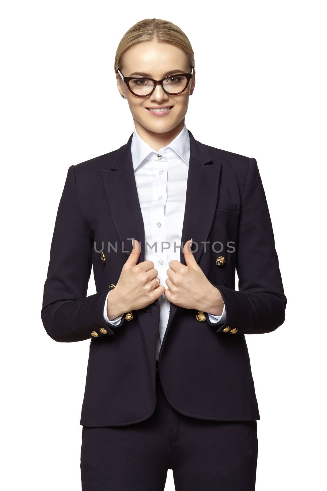 Studio portrait of young successful business woman in a dark eyeglasses and dark business suit.