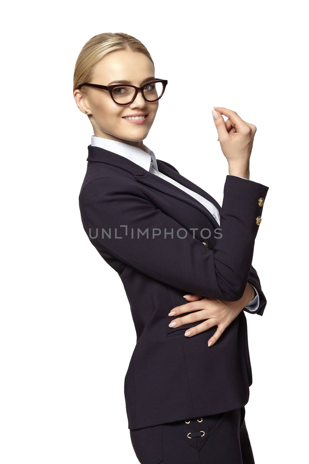 Profile view of a smiling blonde business woman with raised hand. Isolated on white background.