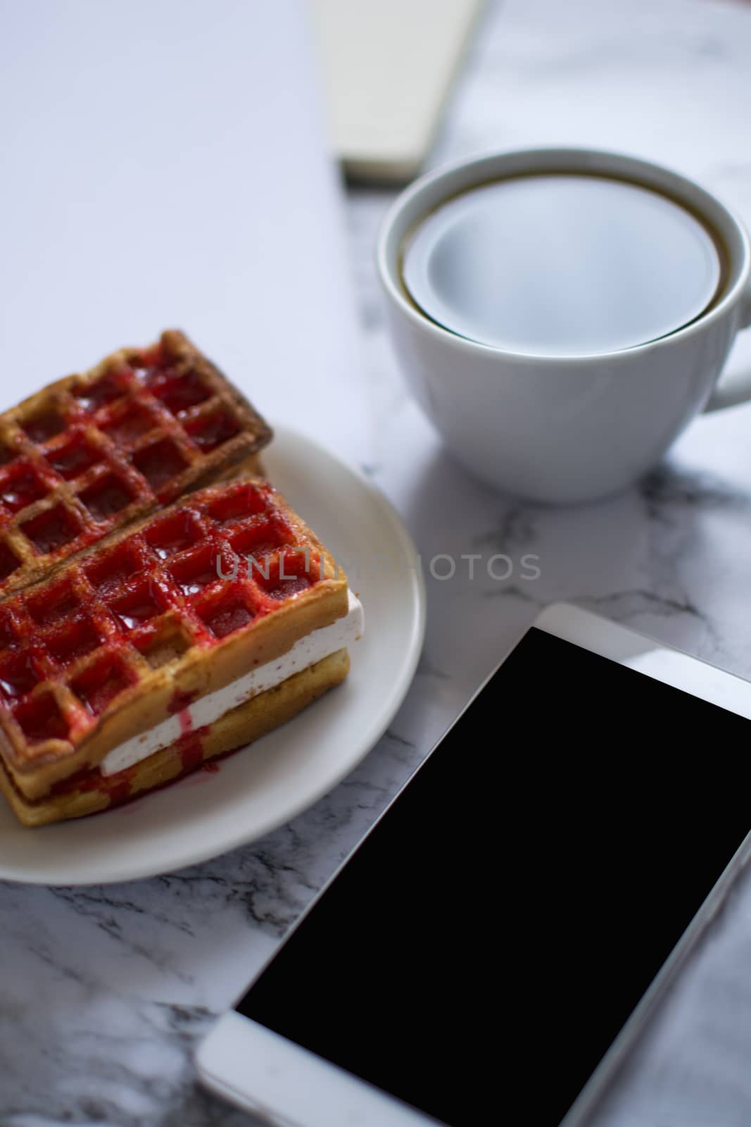 Business lunch: smartphone, dessert, diary on marble background by Izumepho