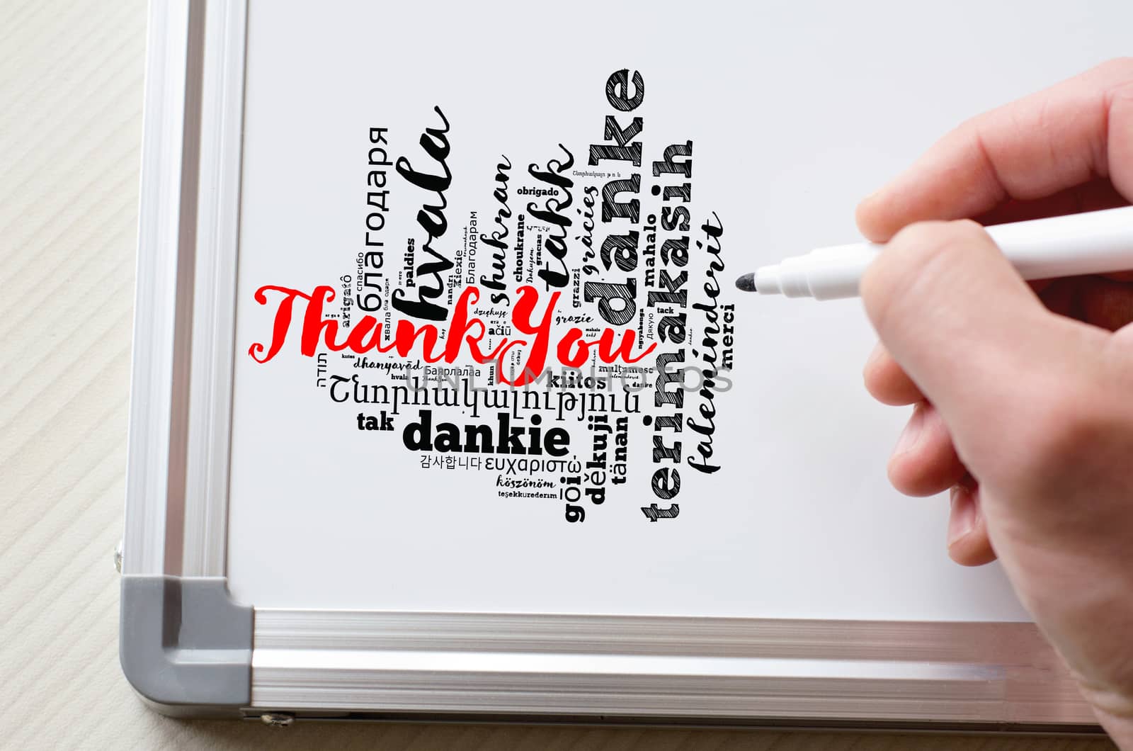 Thank You word cloud in different languages with marker and whiteboard