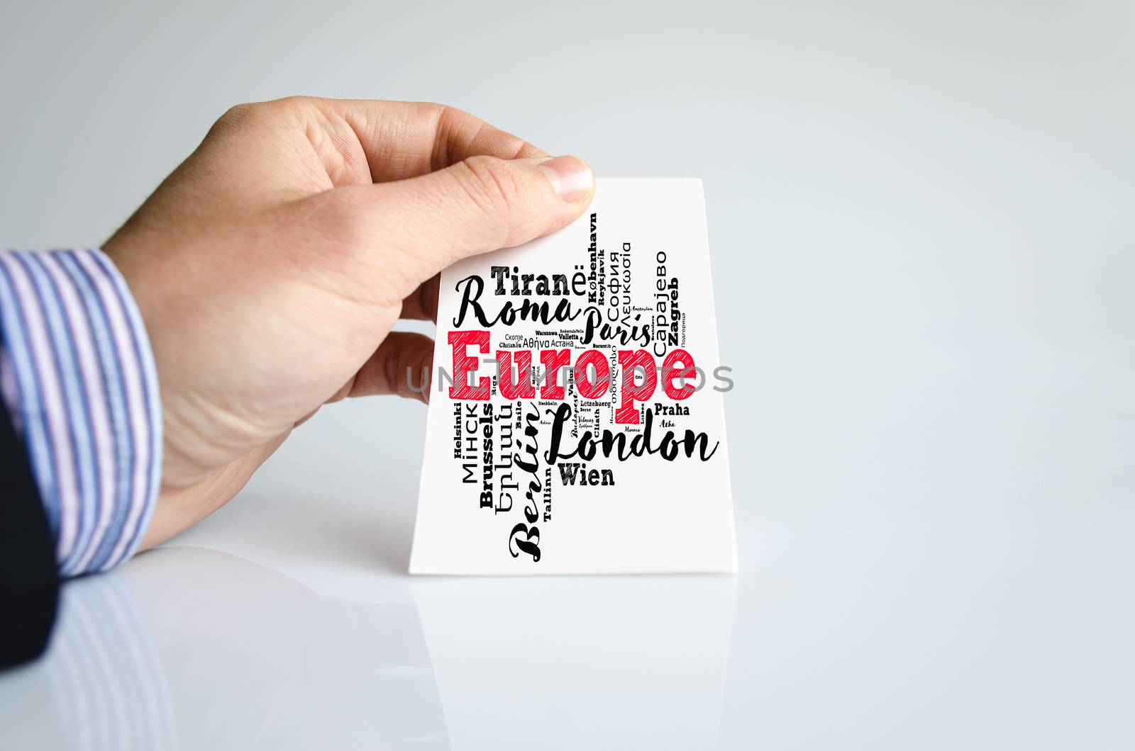 European Union list of cities word cloud collage and human hand