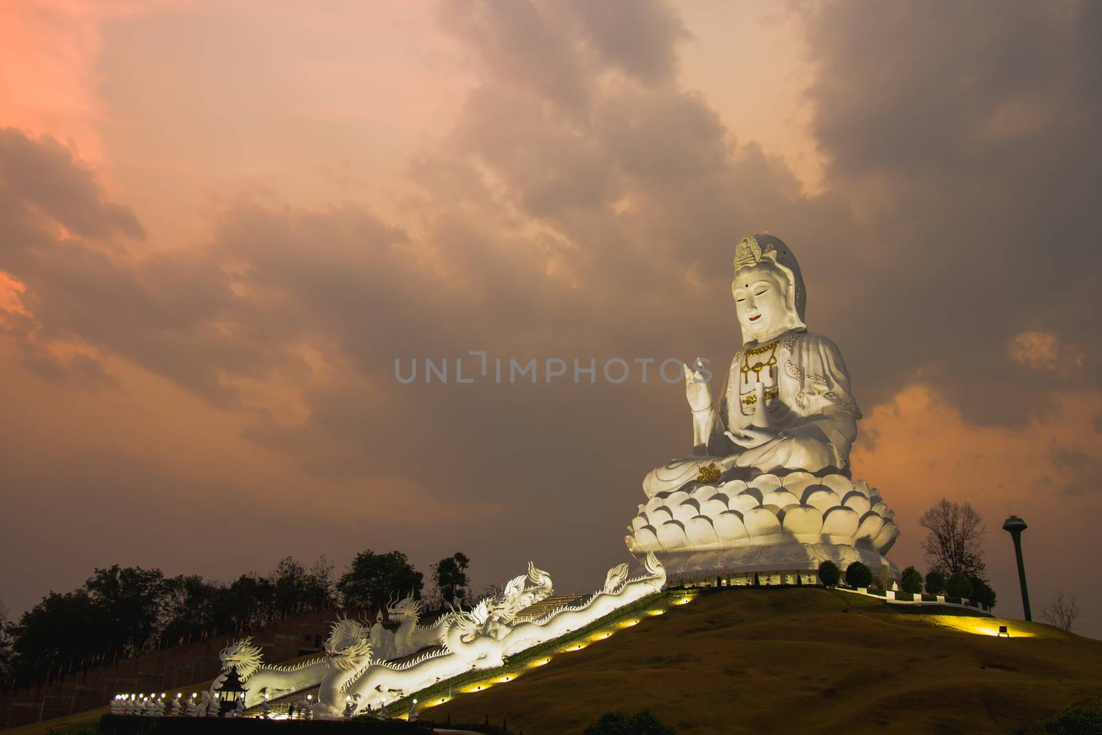 View of Guanyin. on pagoda during twilight at Huai Plakang temple in Chiangrai Thailand