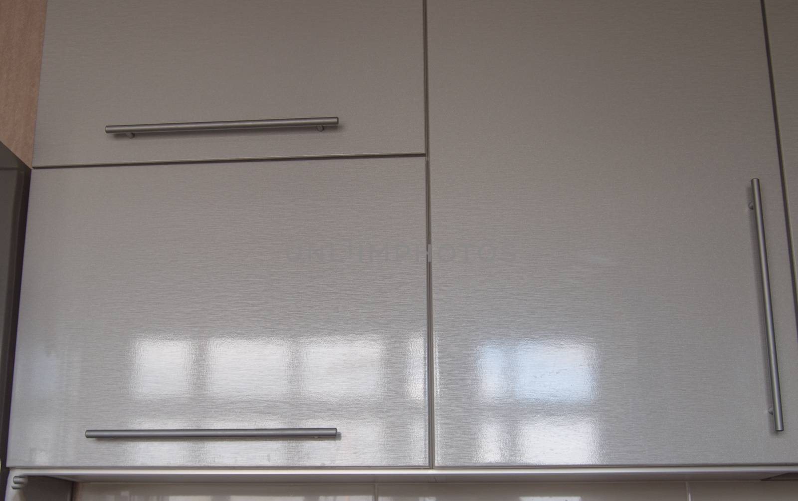Modern kitchen wall Cabinet silver in the interior of the kitchen in the style of minimalism by claire_lucia