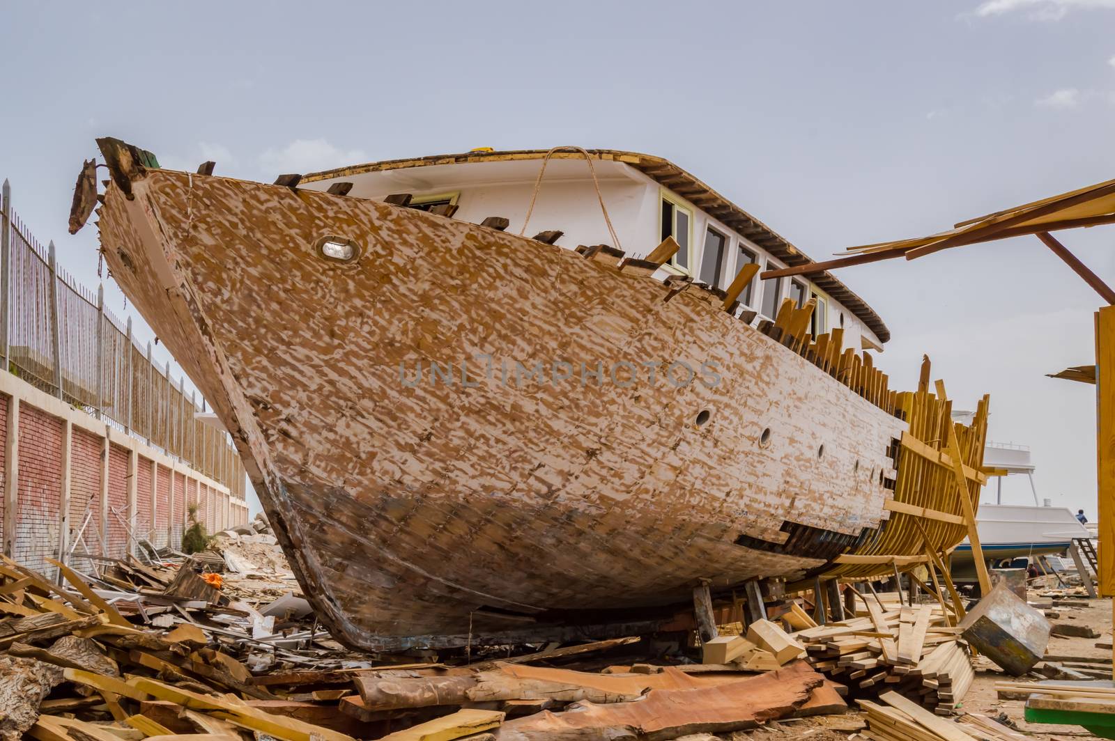 Wooden ship being renovated in a construction  by Philou1000