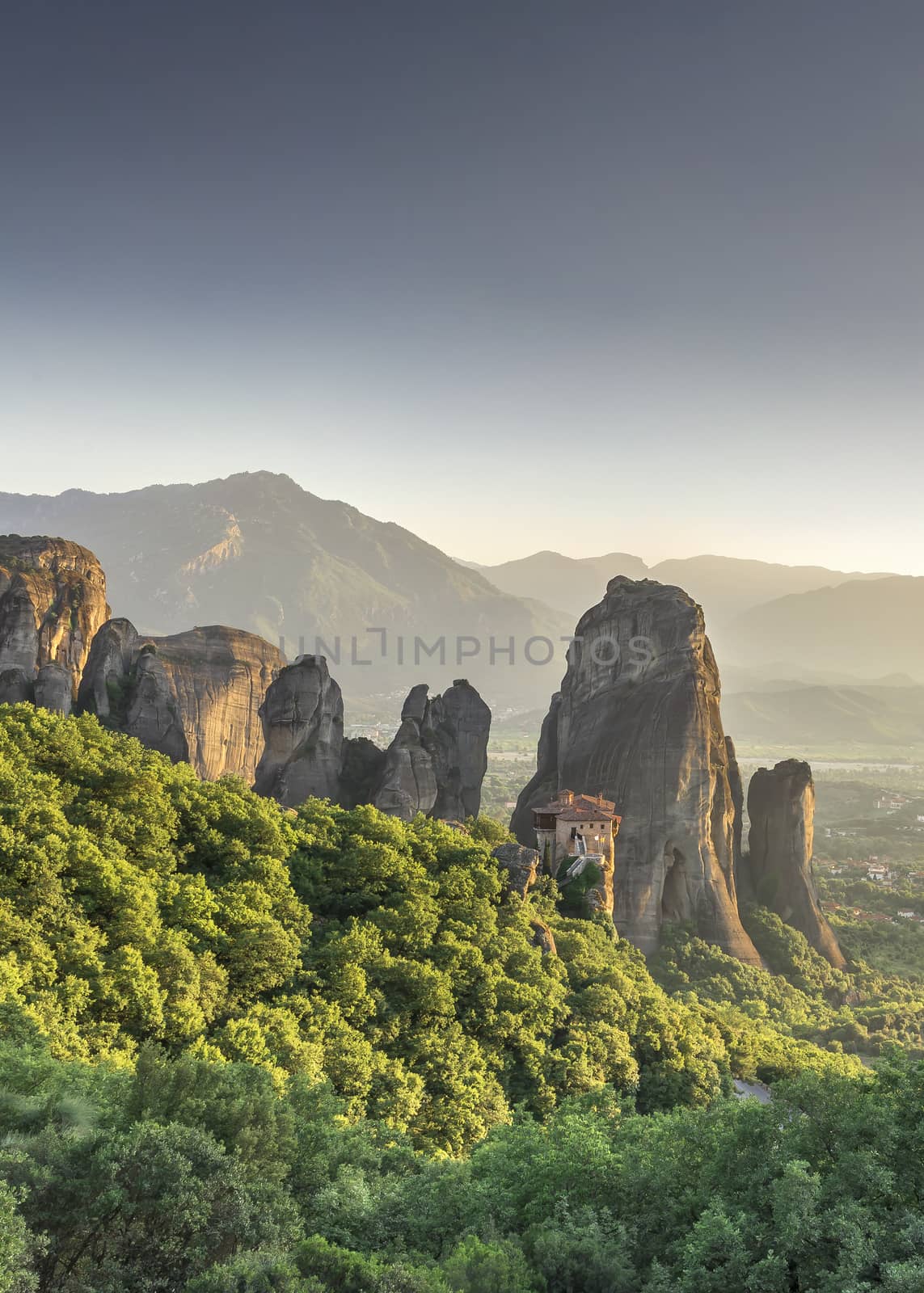 Panoramic view of the Rousanou Monastery in Meteora, Kalambaka town in Greece, on a sunny summer evening