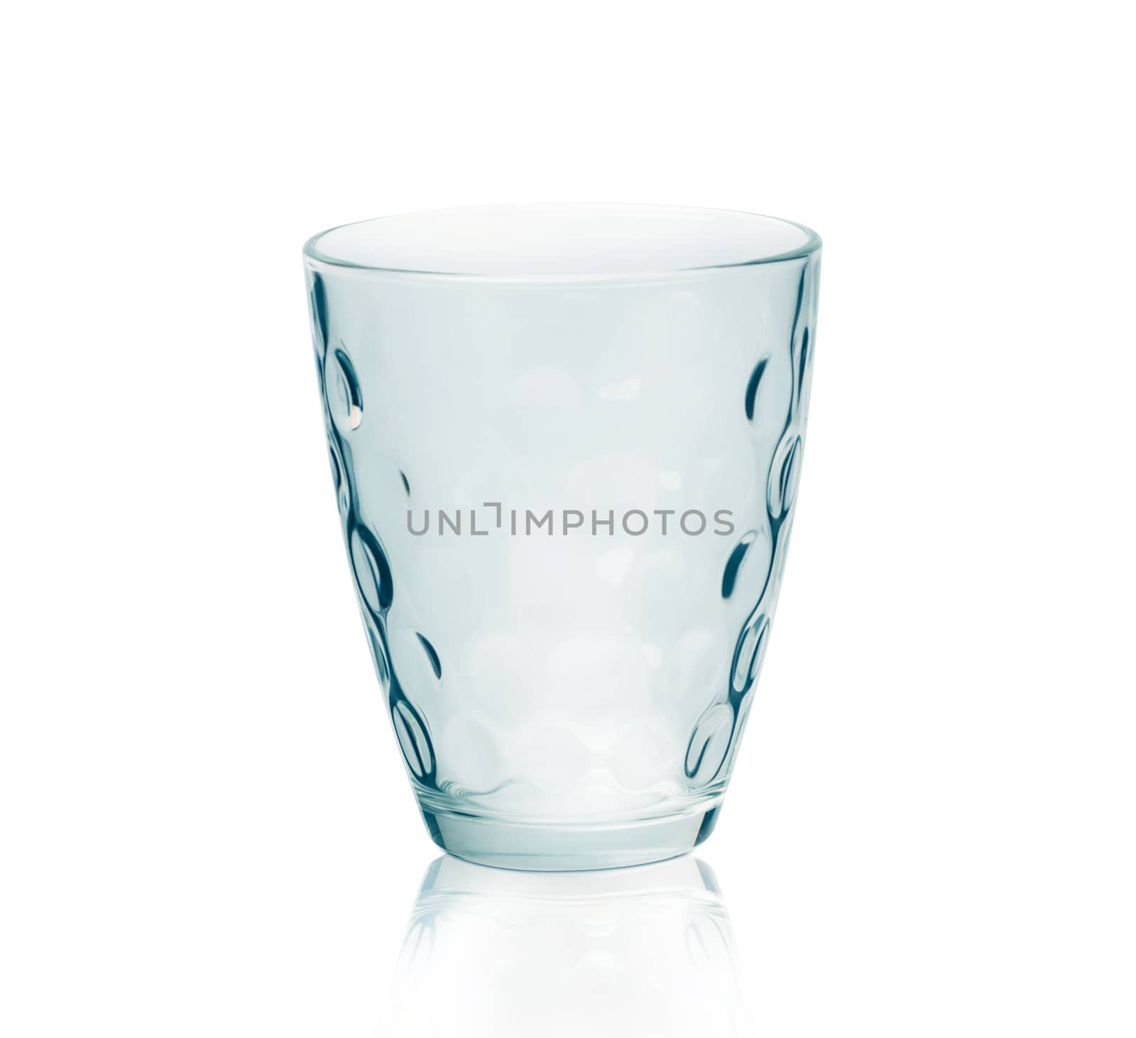 Empty stemless water glass isolated on white background. With clipping path