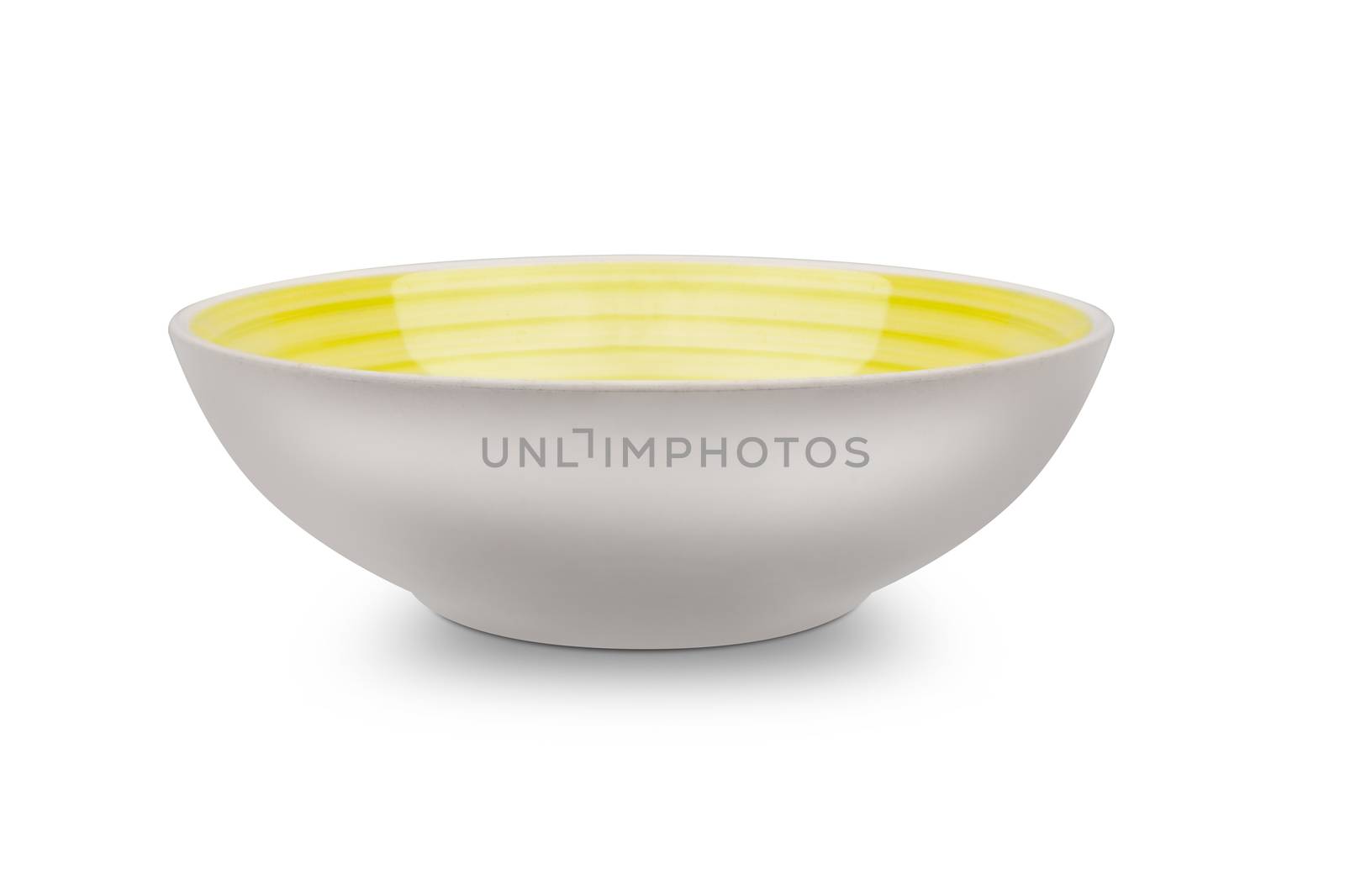 Empty yellow ceramic plate with spiral pattern in watercolor styles. Isolated on white background with clipping path