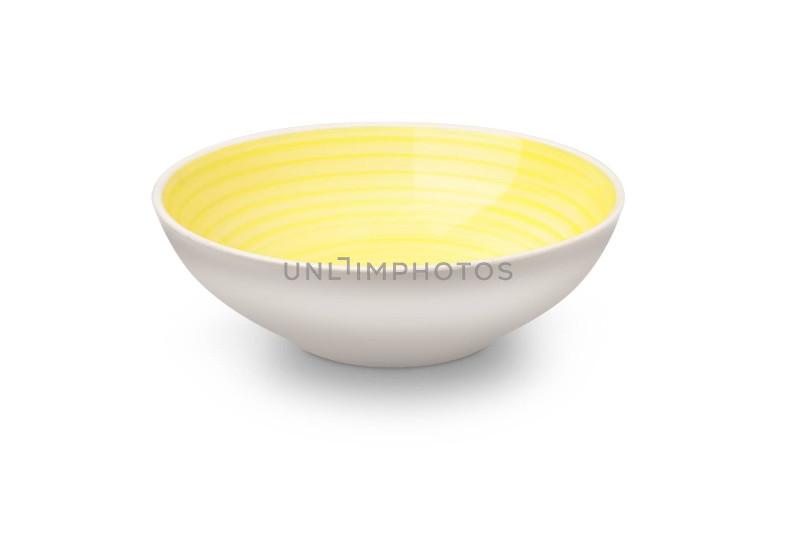 Empty yellow ceramic plate with spiral pattern in watercolor styles. Isolated on white background with clipping path