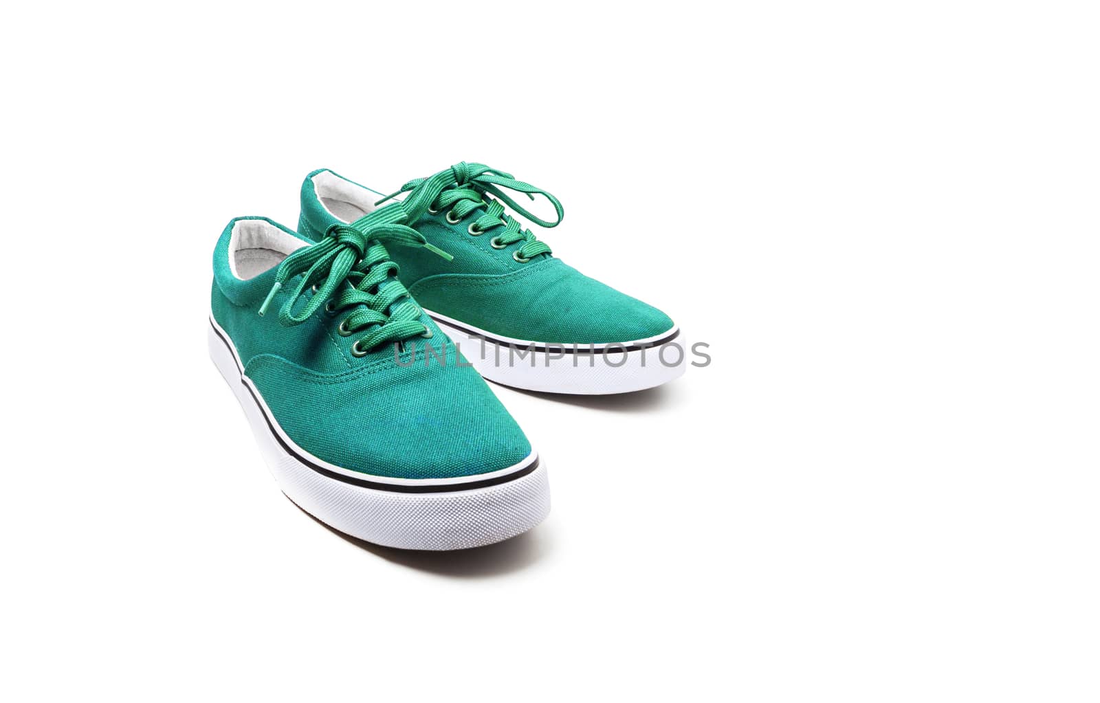 A pair of Green canvas shoes isolated on white background with clipping path