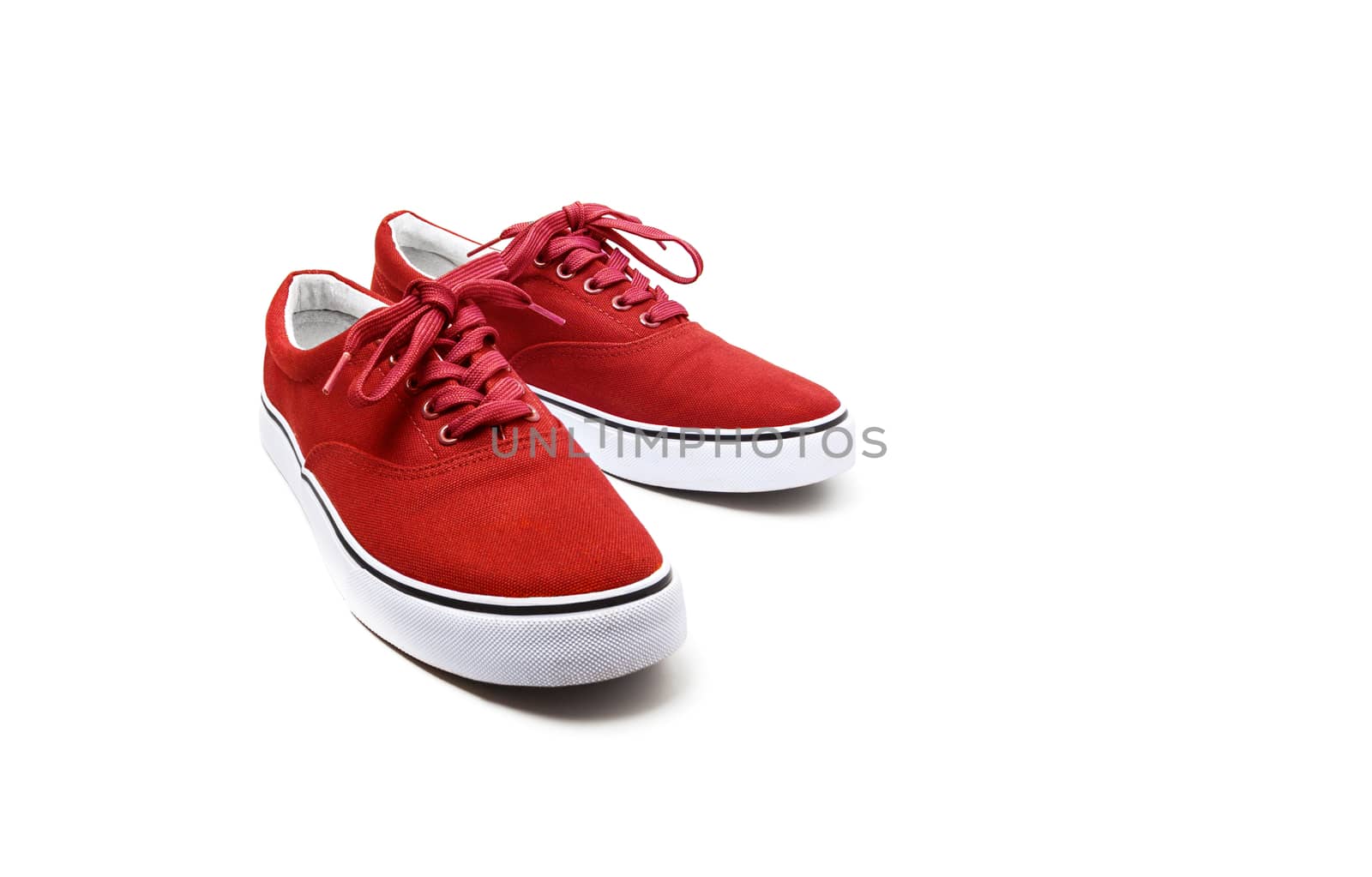 A pair of Red canvas shoes isolated on white background with clipping path