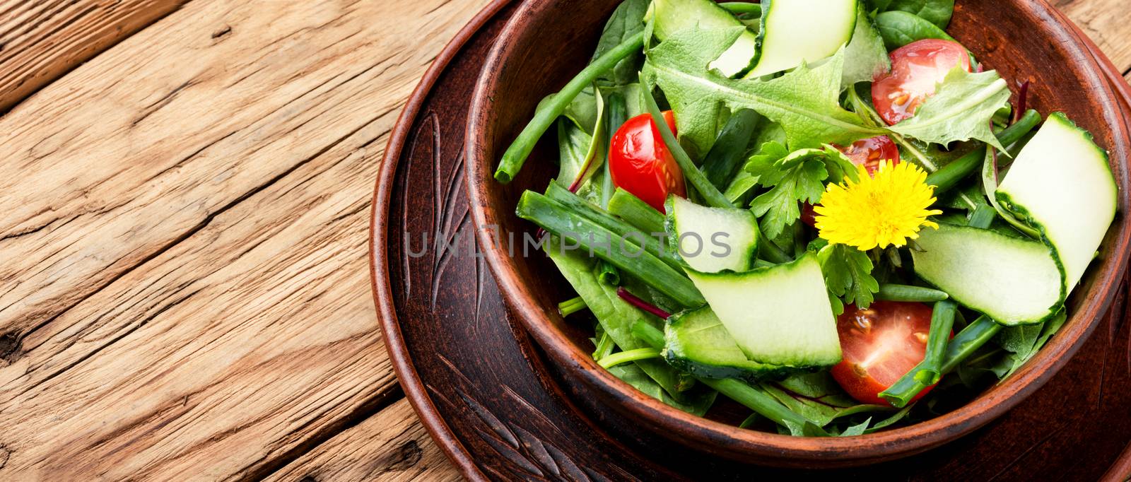 Vegetable salad with fresh lettuce.Healthy spring salad.Mixed leaf salad