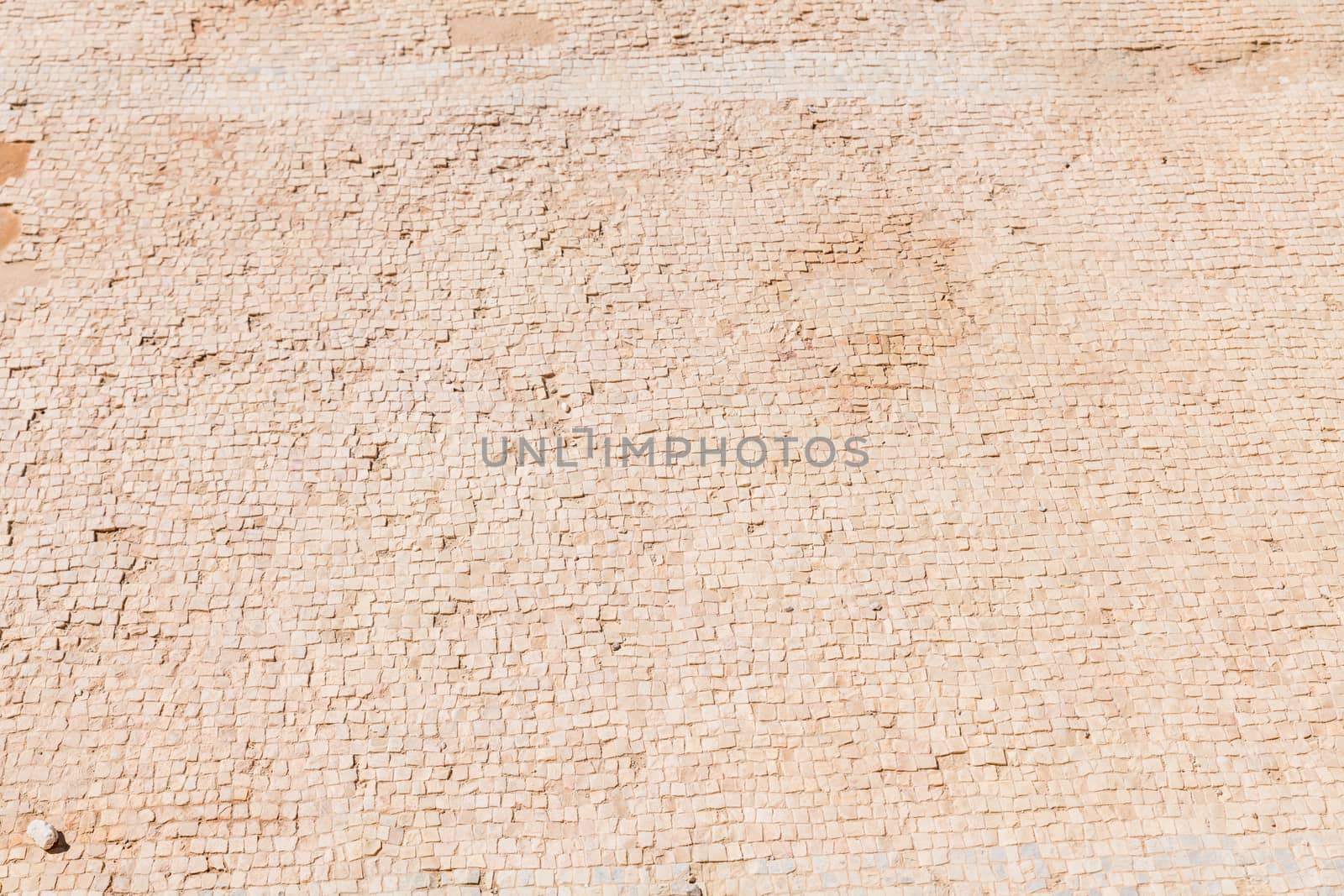 a closeup of a mosaic floor tiles in Masada fort in Israel near the dead sea