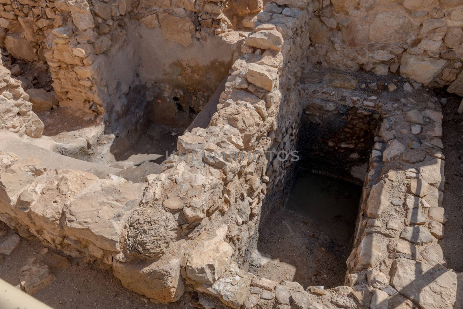 Ruins of the rjewish ritual bath in ancient Masada fortress in Israel,build by Herod the great