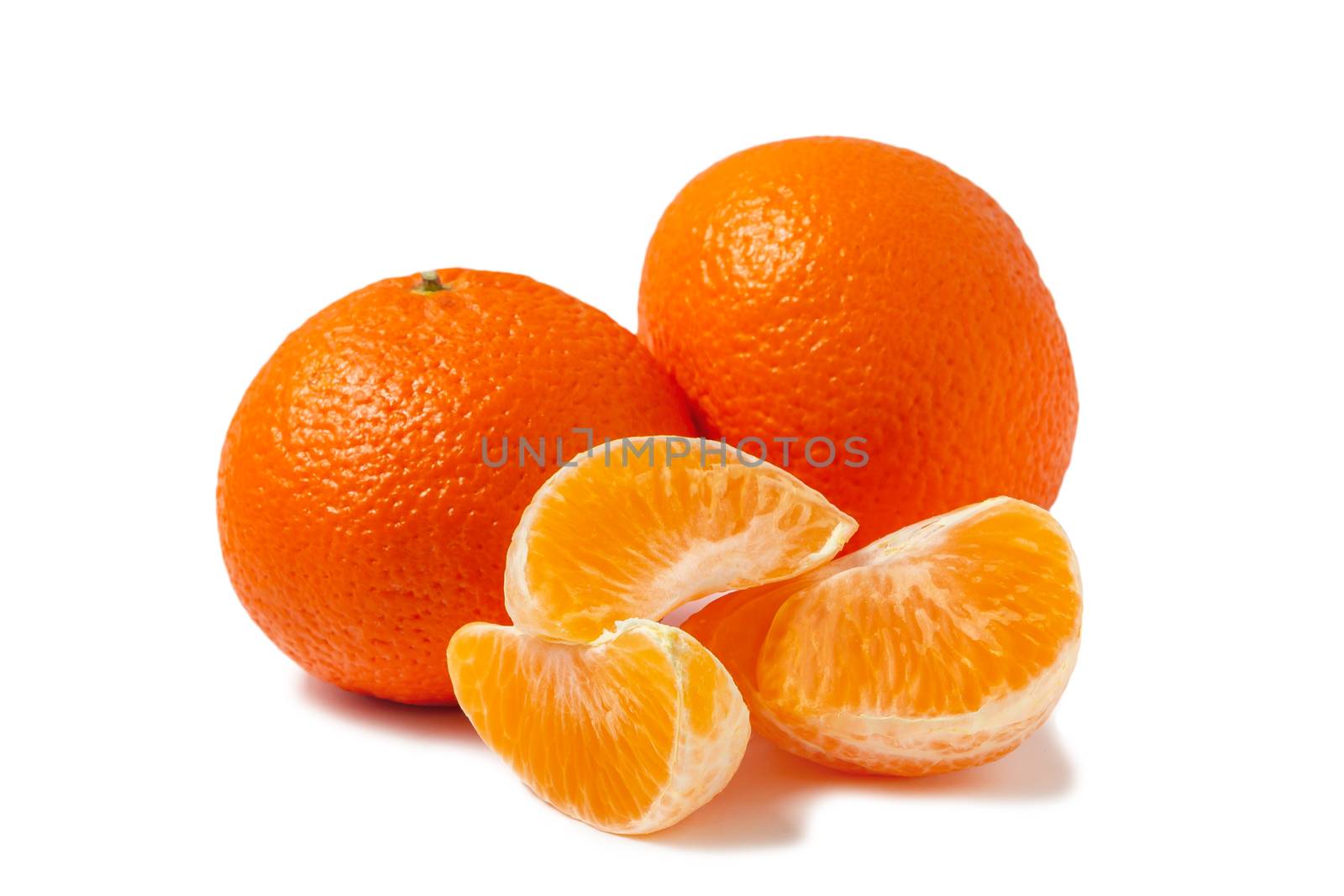 Two whole tangerine and peeled tangerine slices isolated on white background with shadow