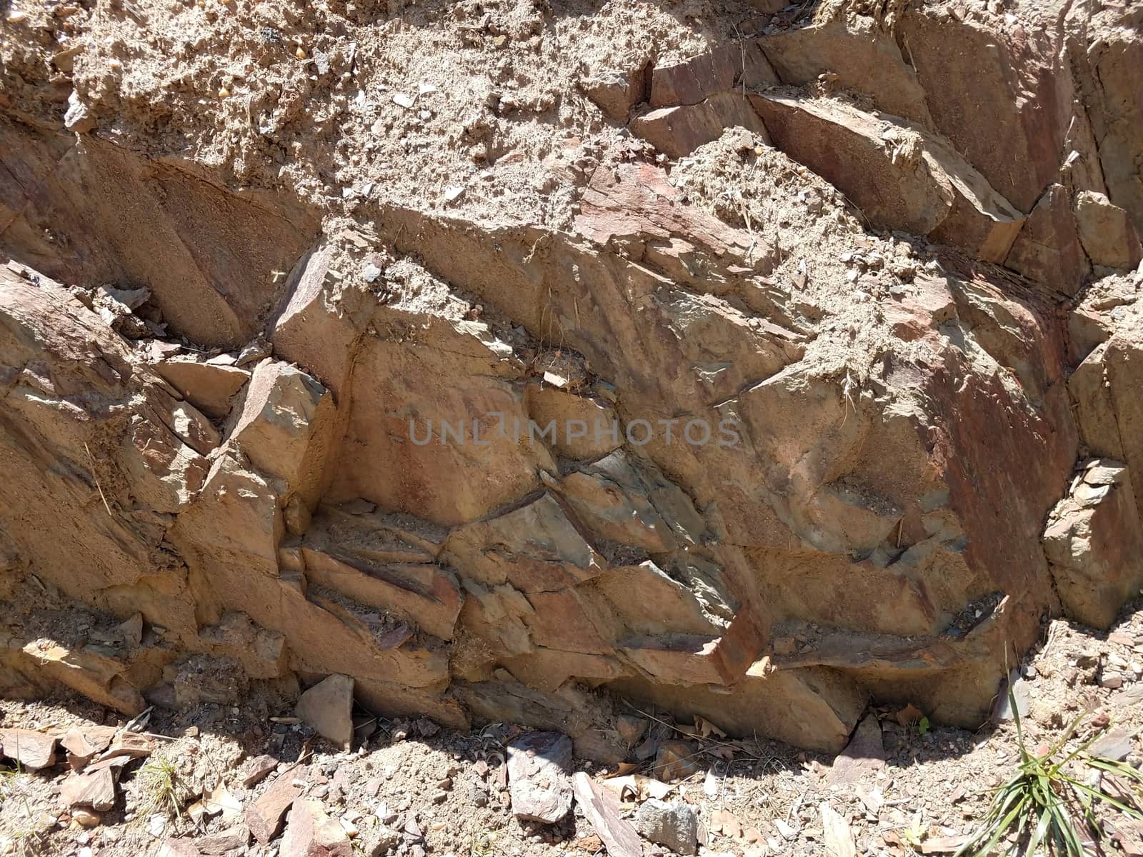 red and grey rock or boulder or stone outdoor geology by stockphotofan1