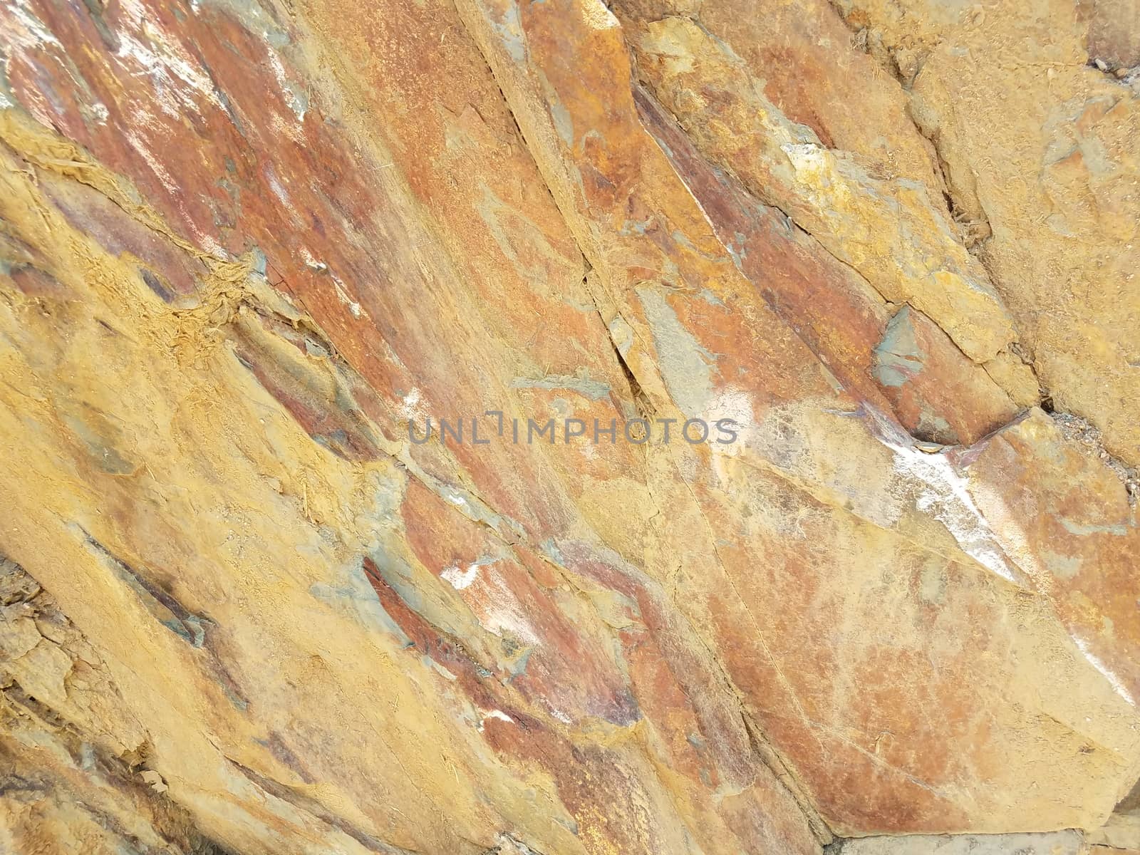 red and grey rock or boulder or stone outdoor geology by stockphotofan1
