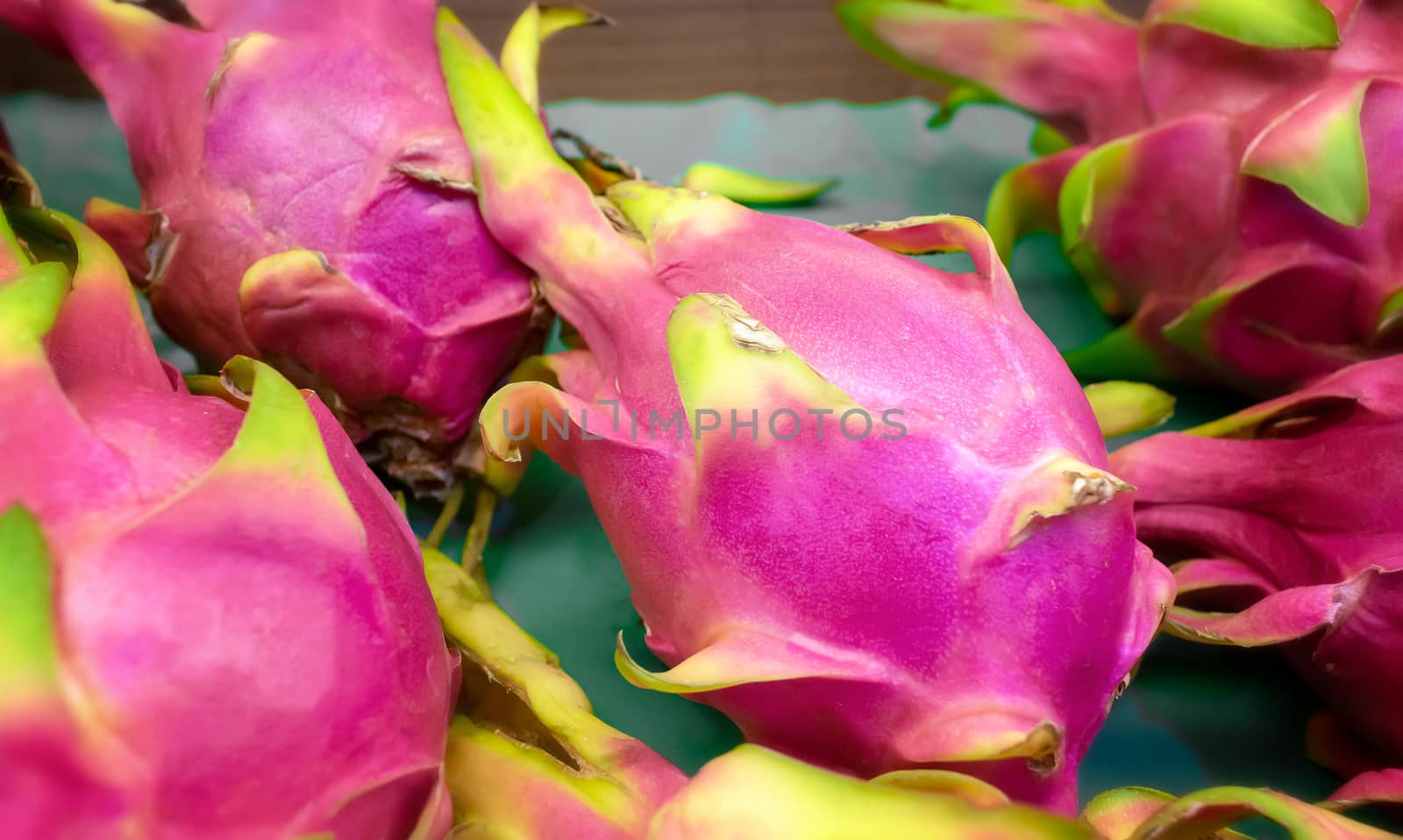Ripe Tropical Pitaya Dragon Fruit selection in the Market. by seika_chujo