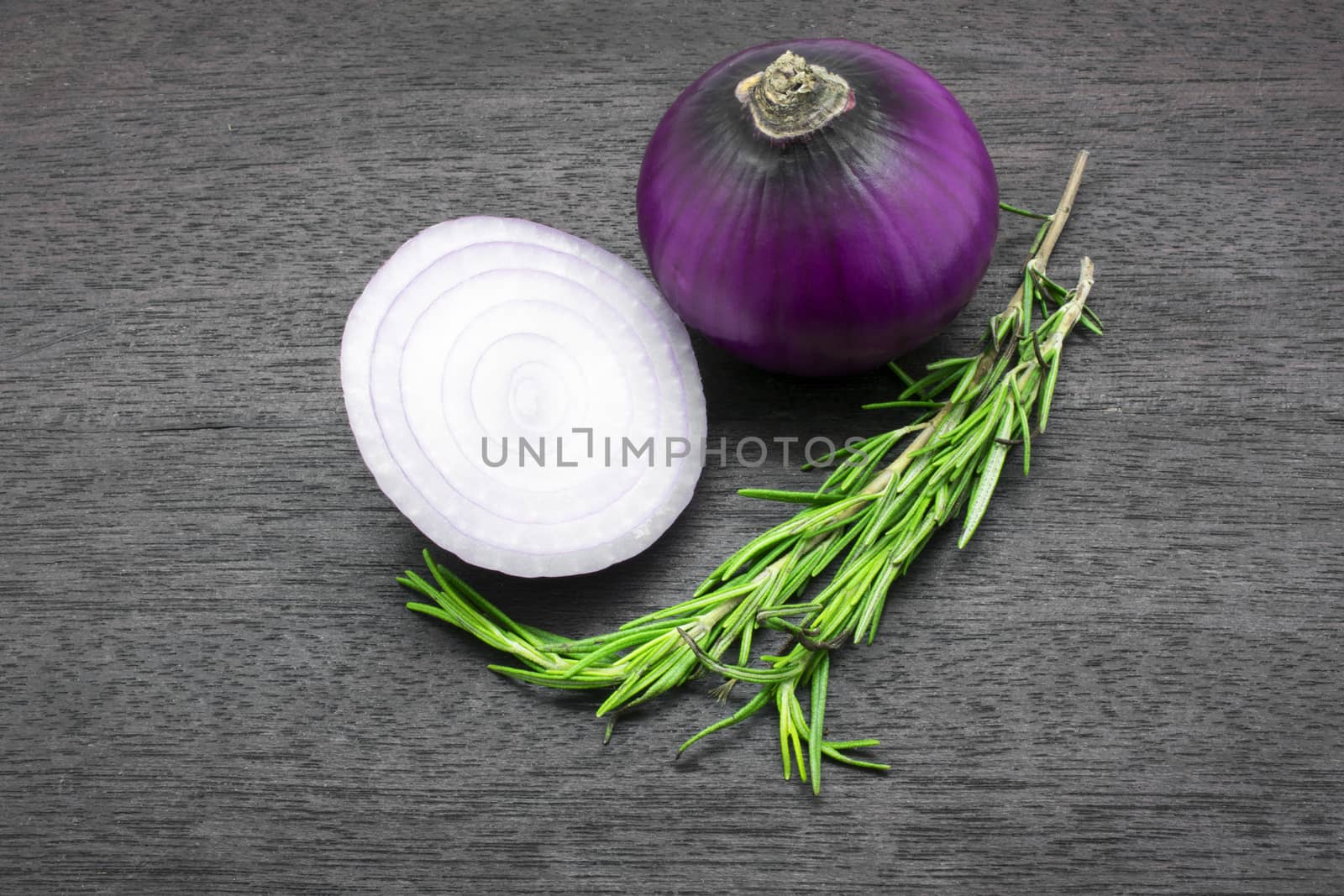 Onions and Rosemary being Prepared on a Cutting Board by seika_chujo