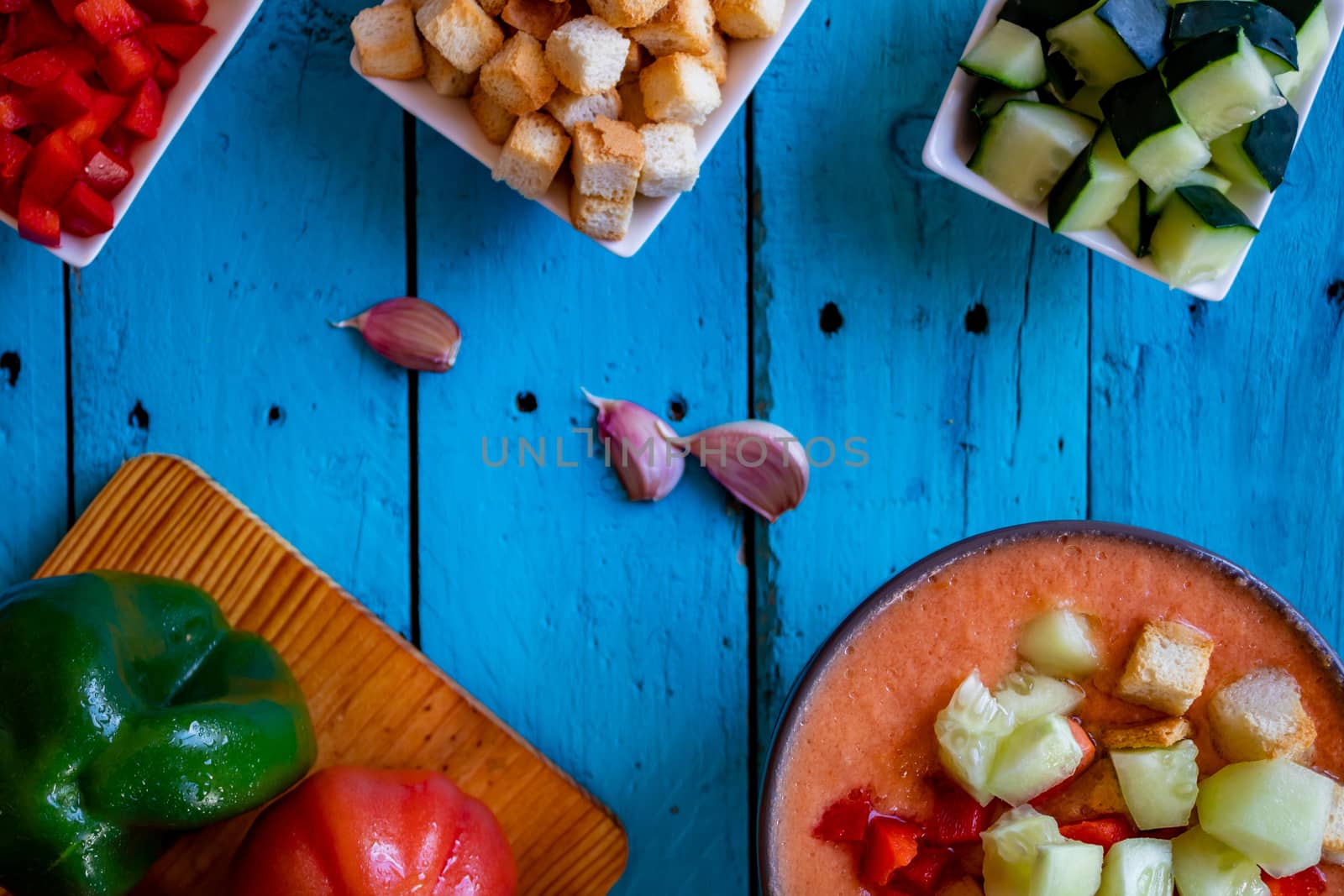 View of gazpacho, a typical Spanish meal with its ingredients in composition