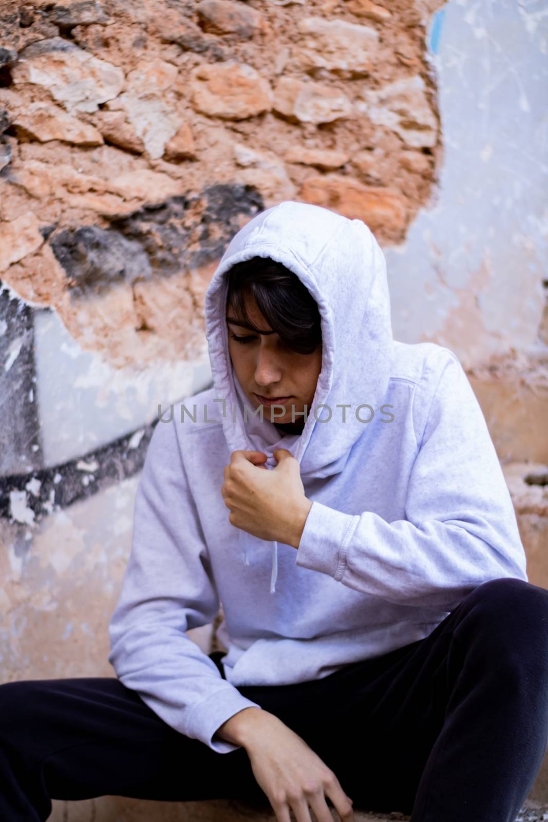 Young boy posing in abandoned house