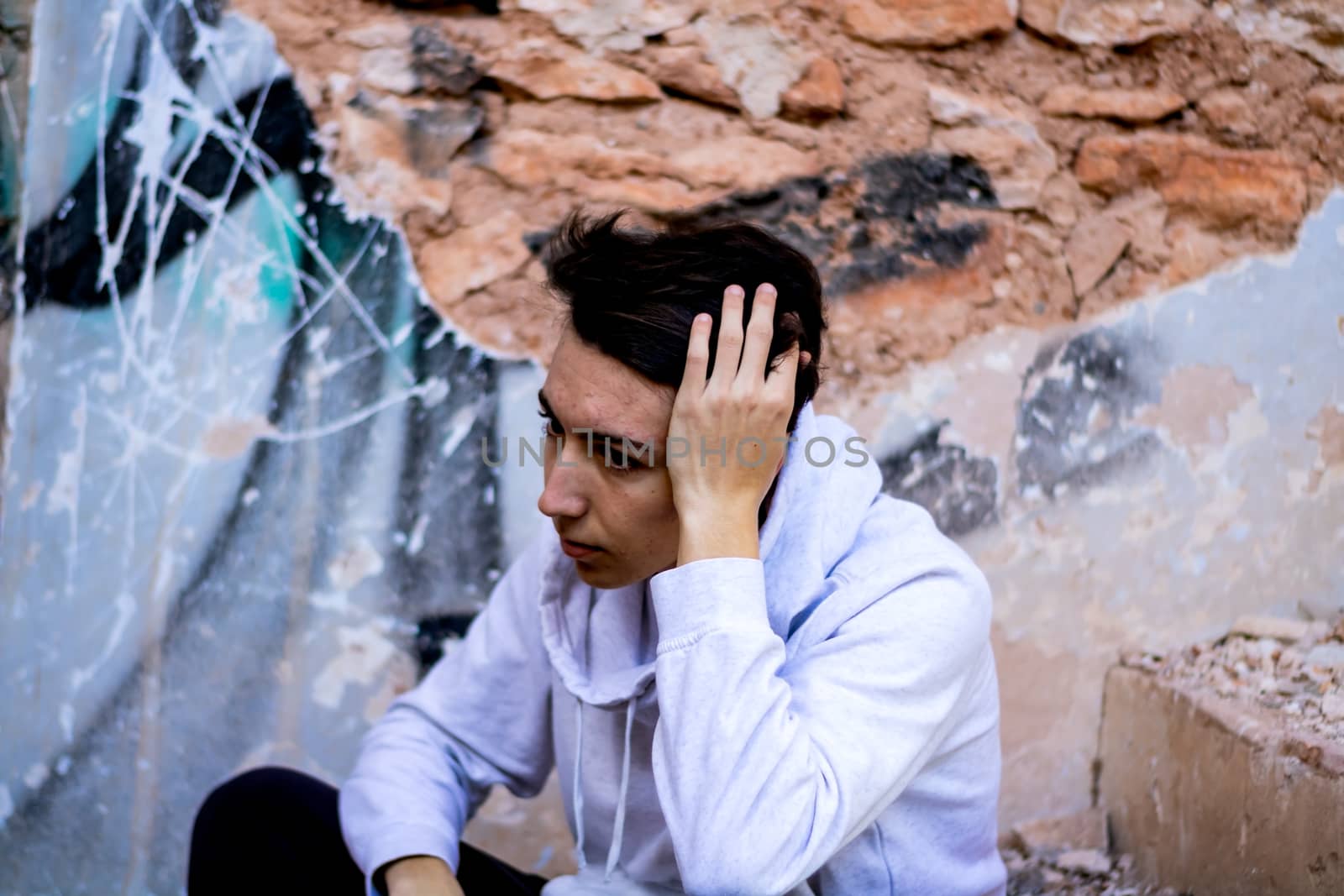 Young boy posing in abandoned house