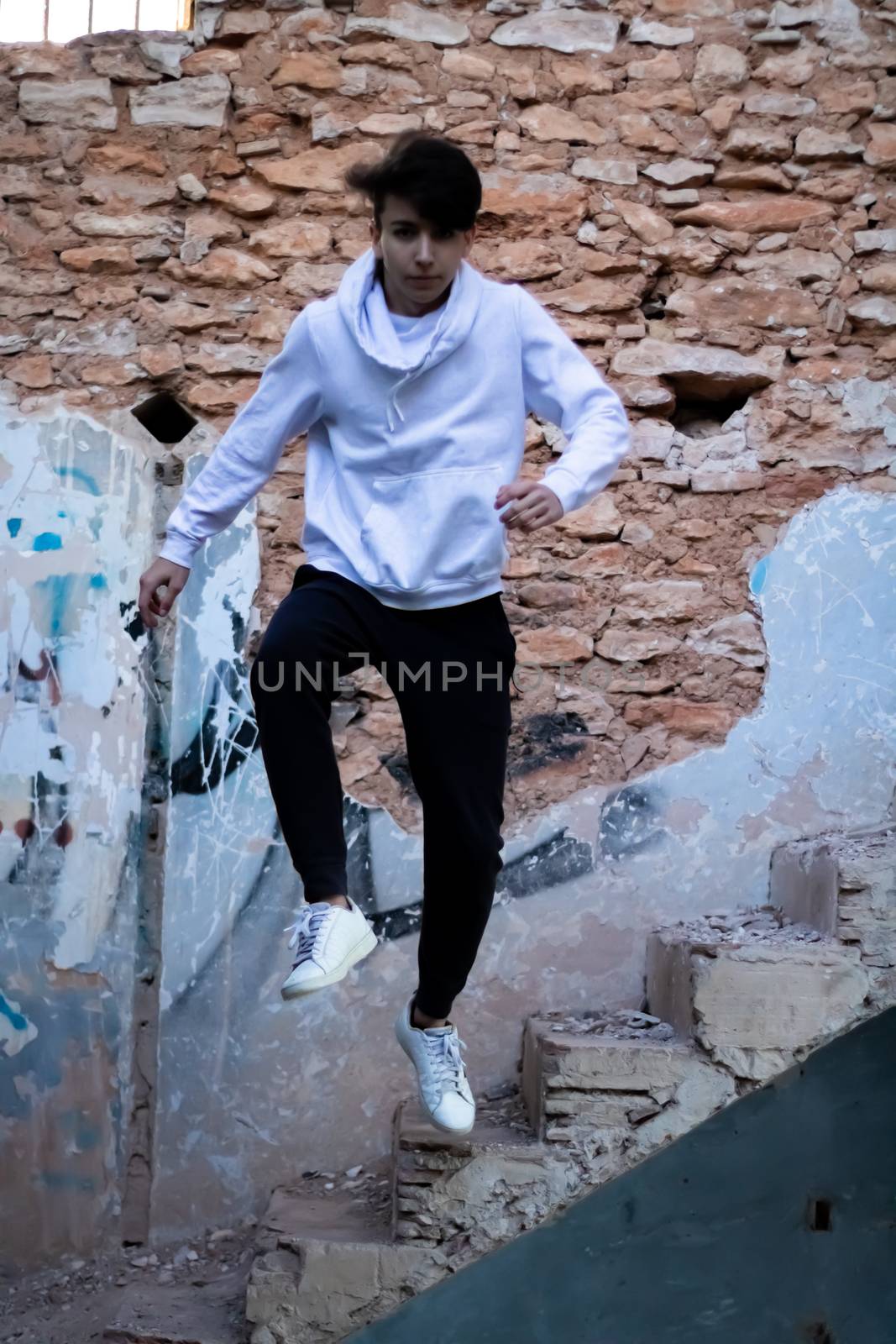 Young boy posing in abandoned house