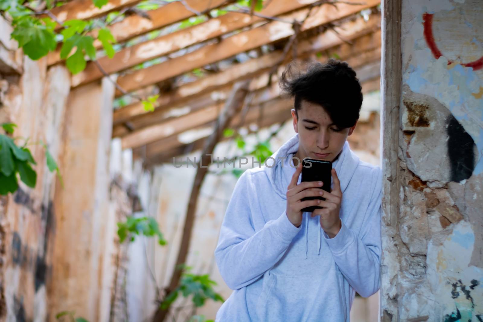 Young boy posing in abandoned house