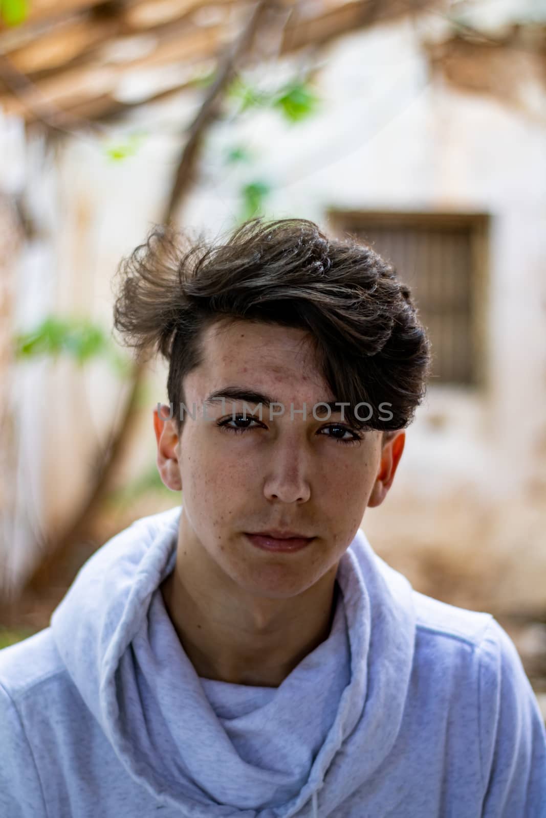 Young boy posing in abandoned house