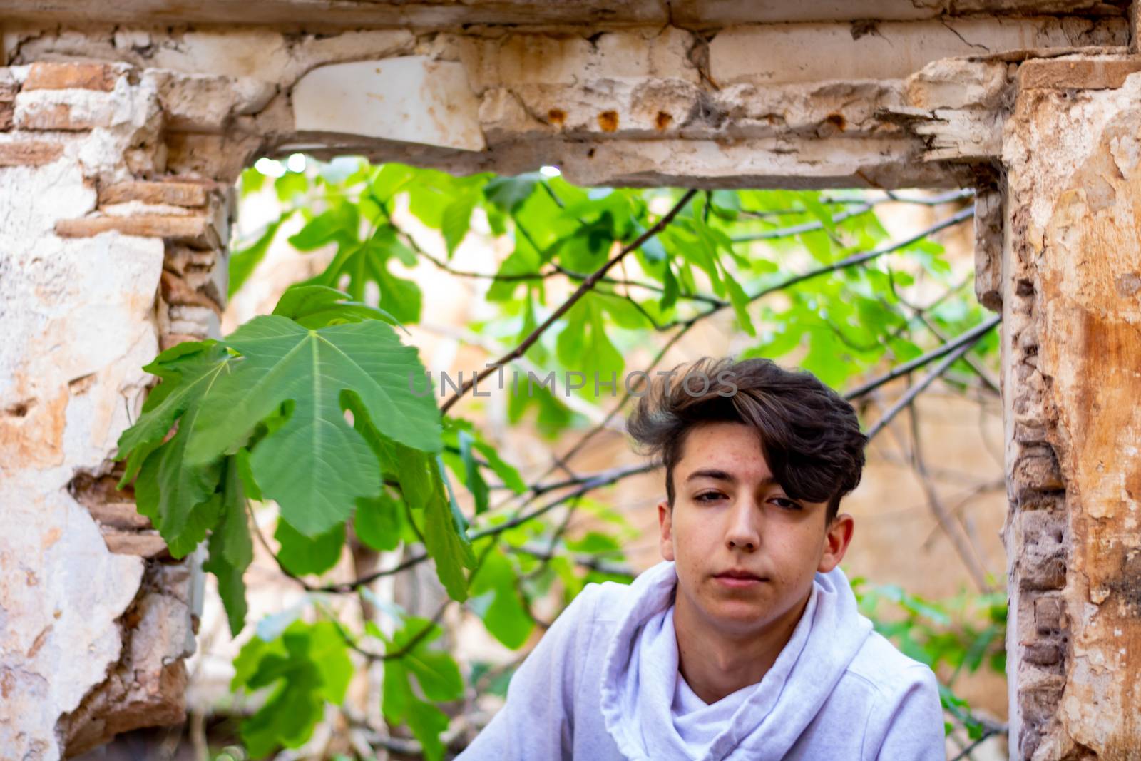 Young boy posing in abandoned house