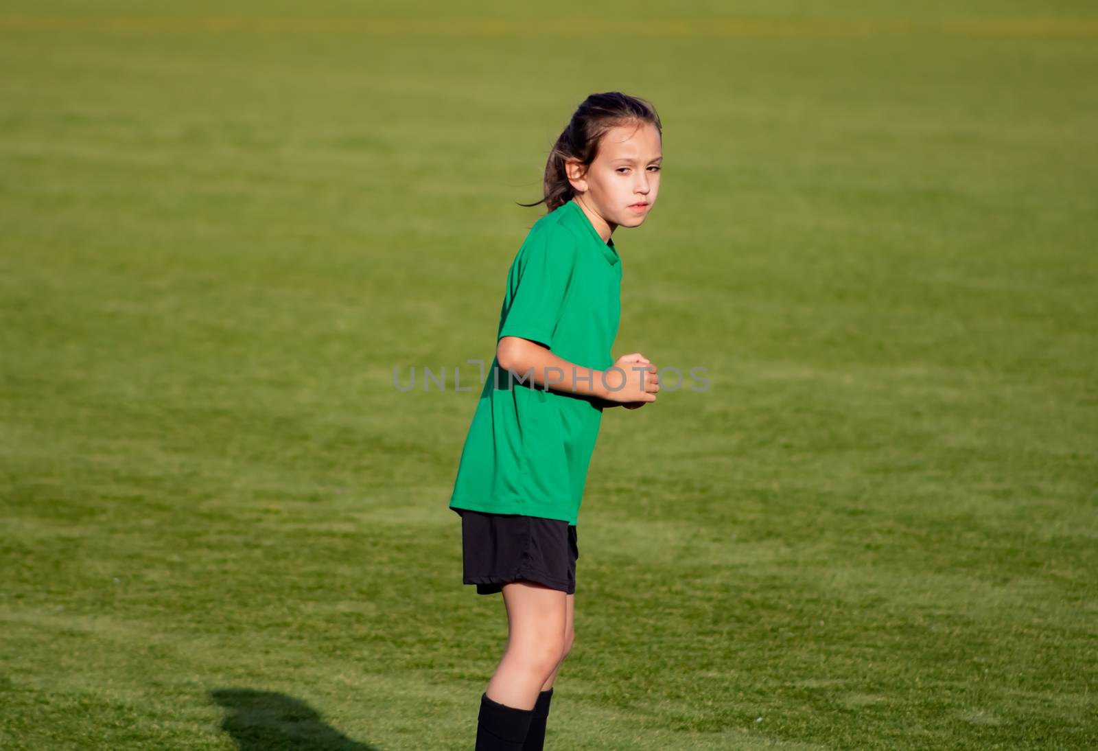 Little girl in a soccer training in Burriana