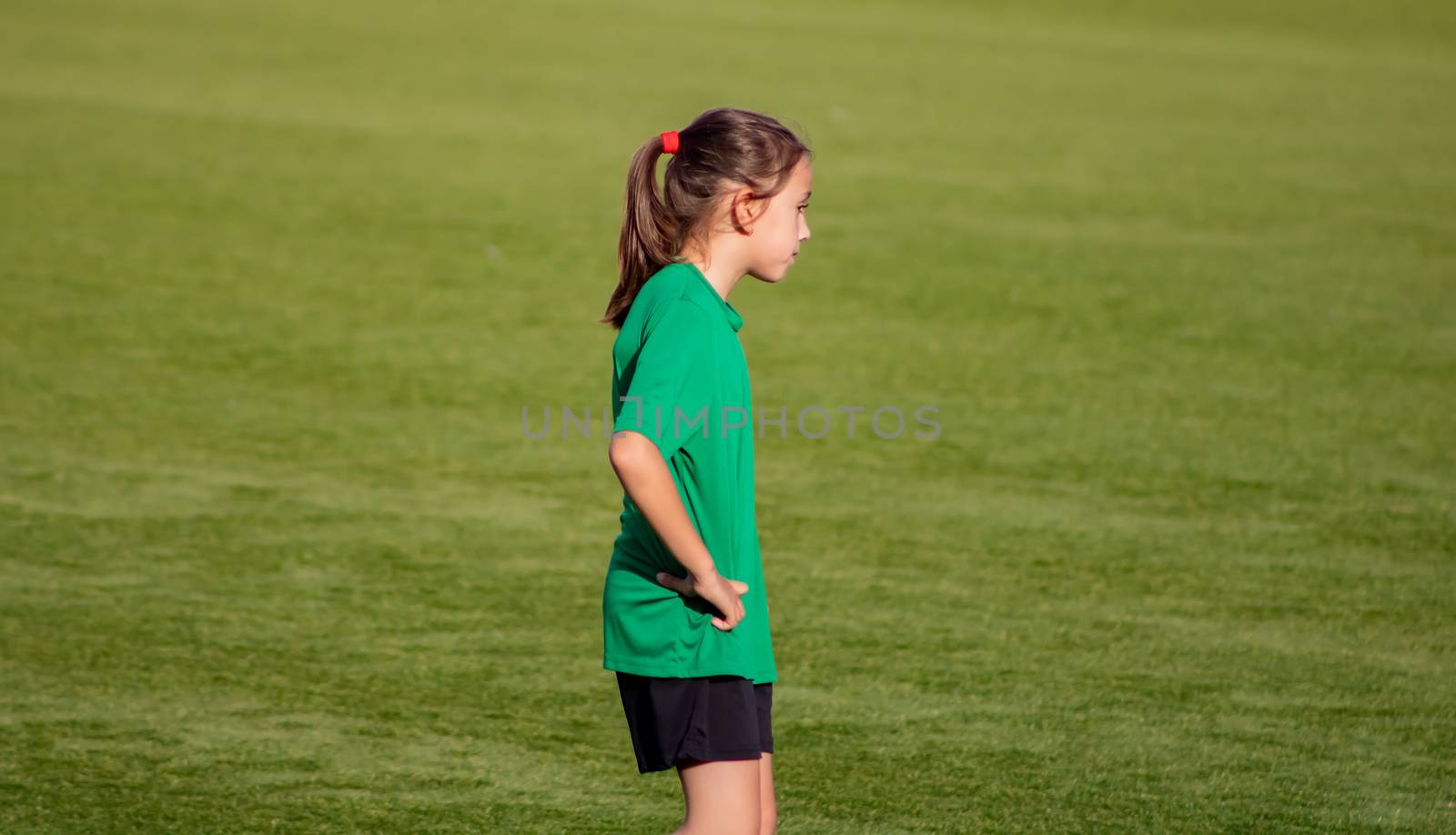 Little girl in a soccer training in Burriana