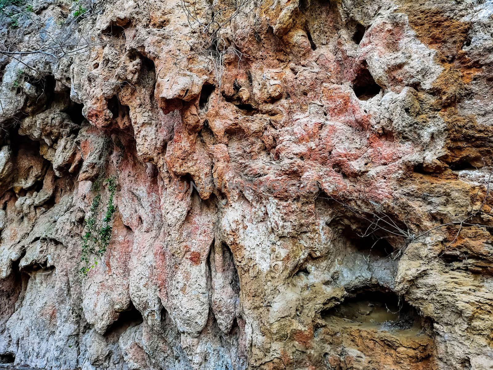 Natural rock background in brown and purple tones