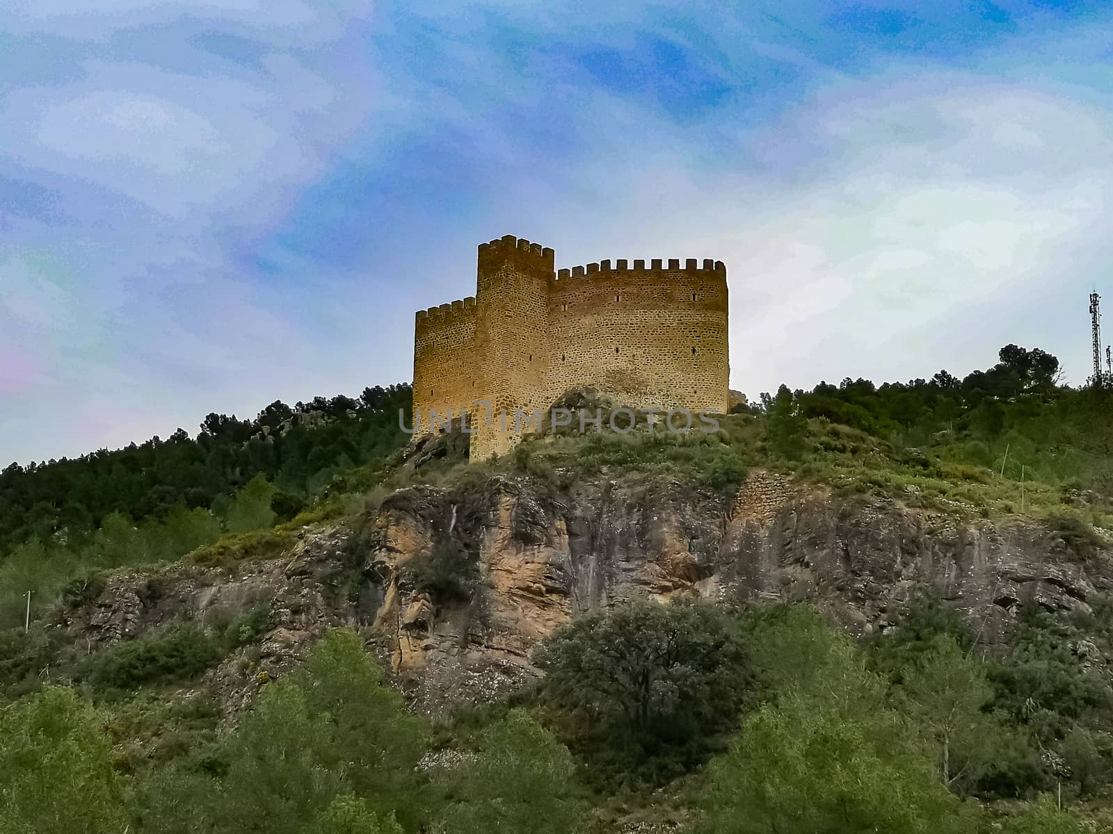 View of the old castle of Gaibiel with cloudy sky
