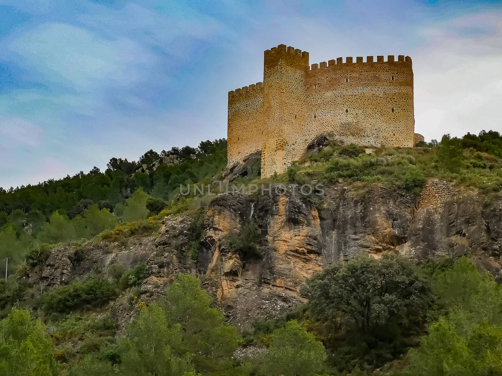 View of the old castle of Gaibiel with cloudy sky
