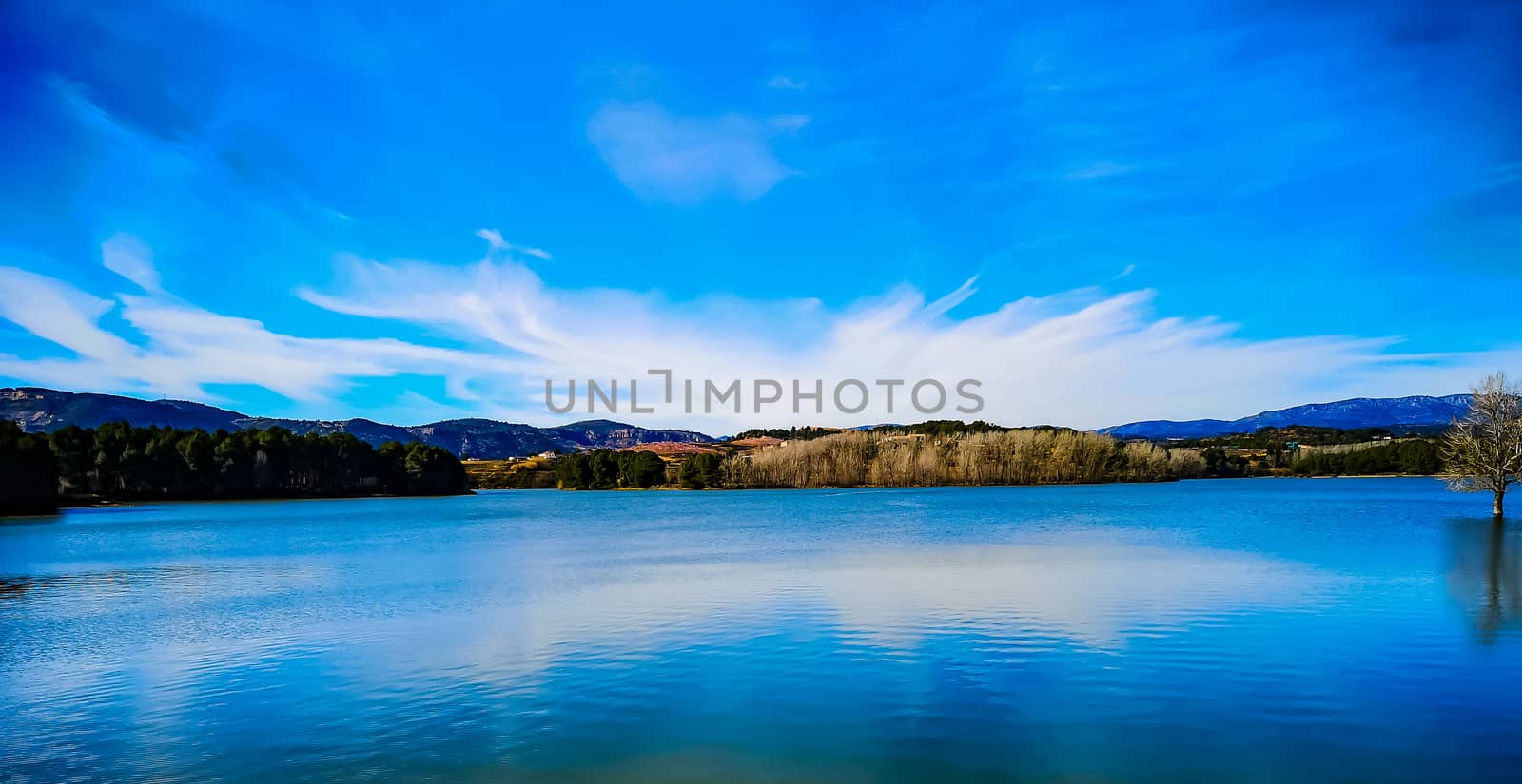 View of the Regajo reservoir with the mountains in the background
