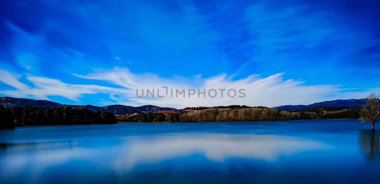 View of the Regajo reservoir with the mountains in the background