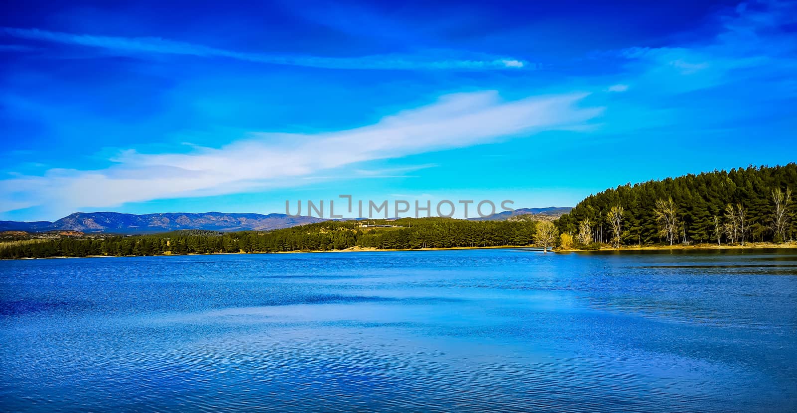View of the Regajo reservoir with the mountains in the background